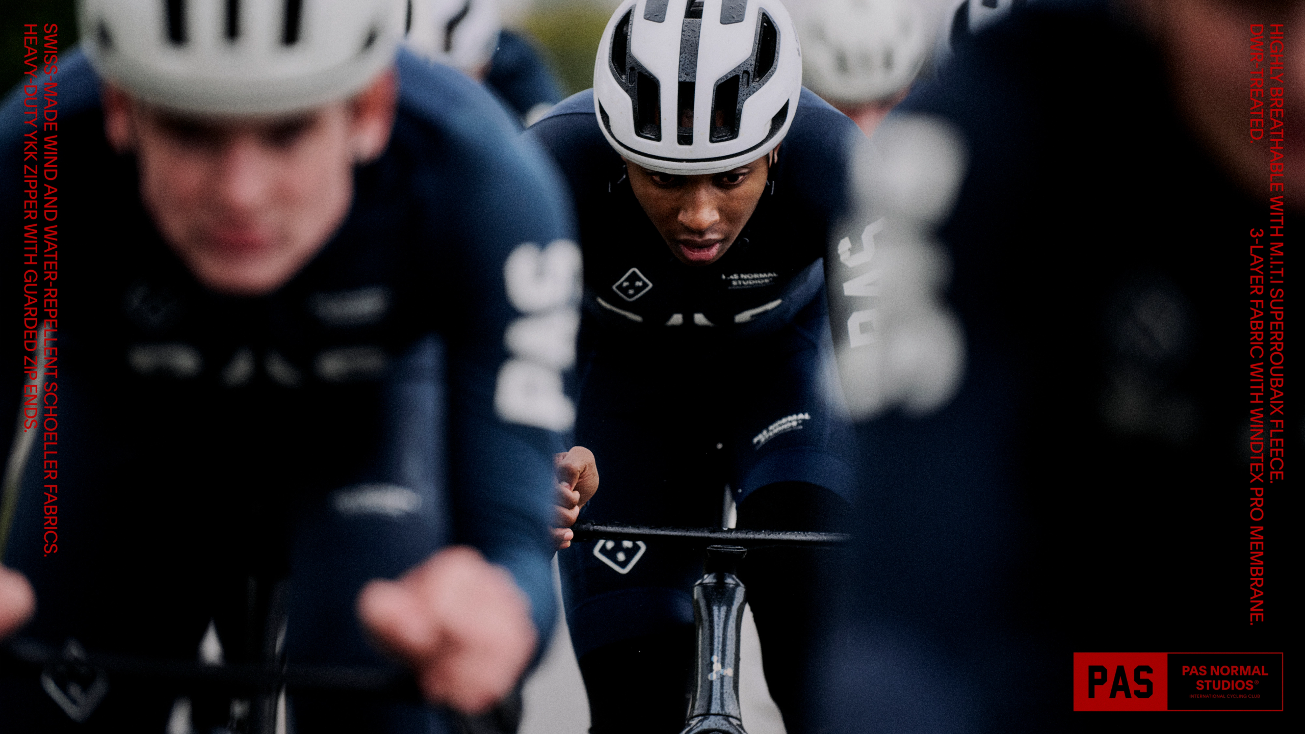 Navy PAS Mechanism Thermal long sleeve cycling jersey on cyclist in aerodynamic position