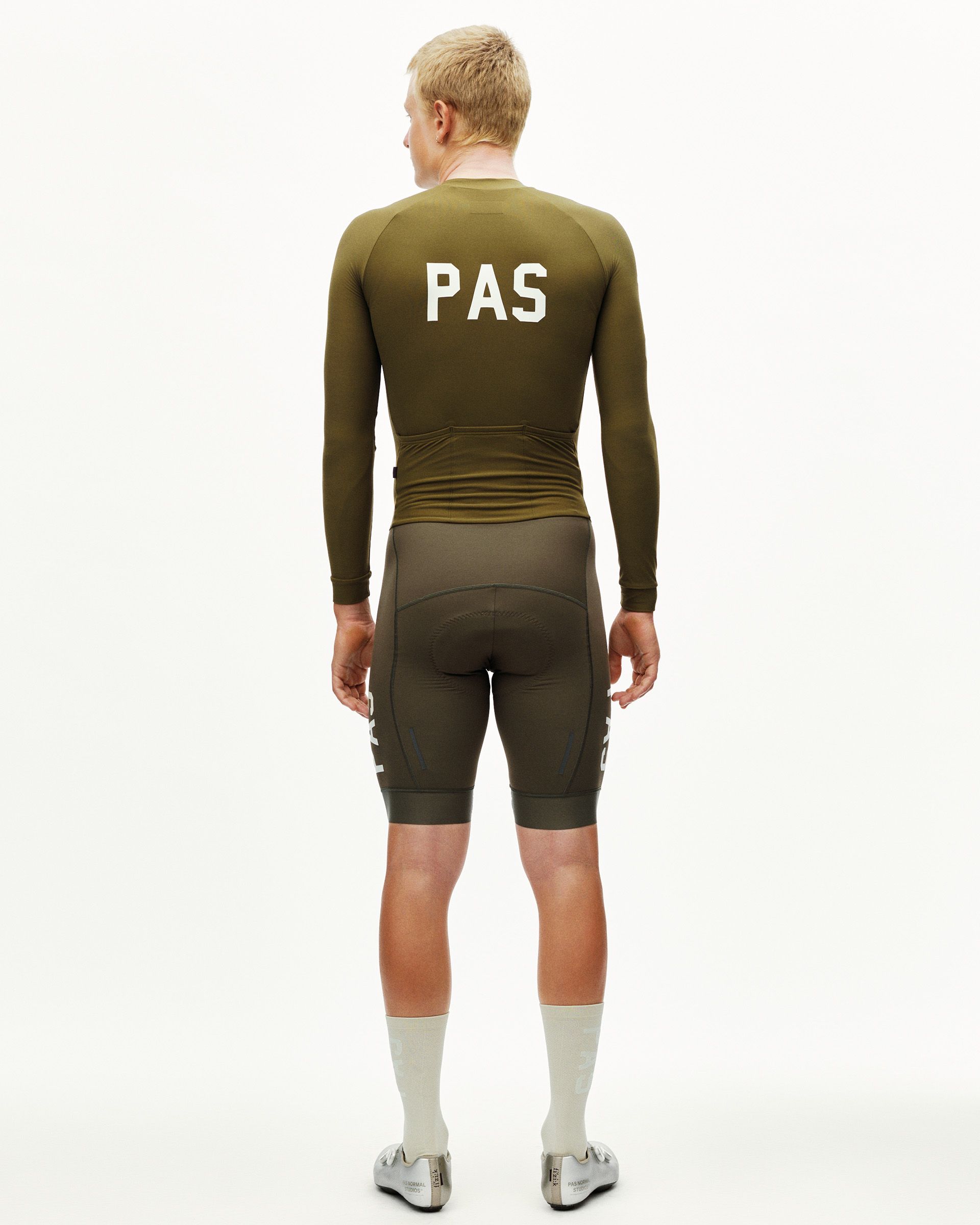 Moss Brown PAS Thermal cycling speedsuit on model, rear view with white PAS back print