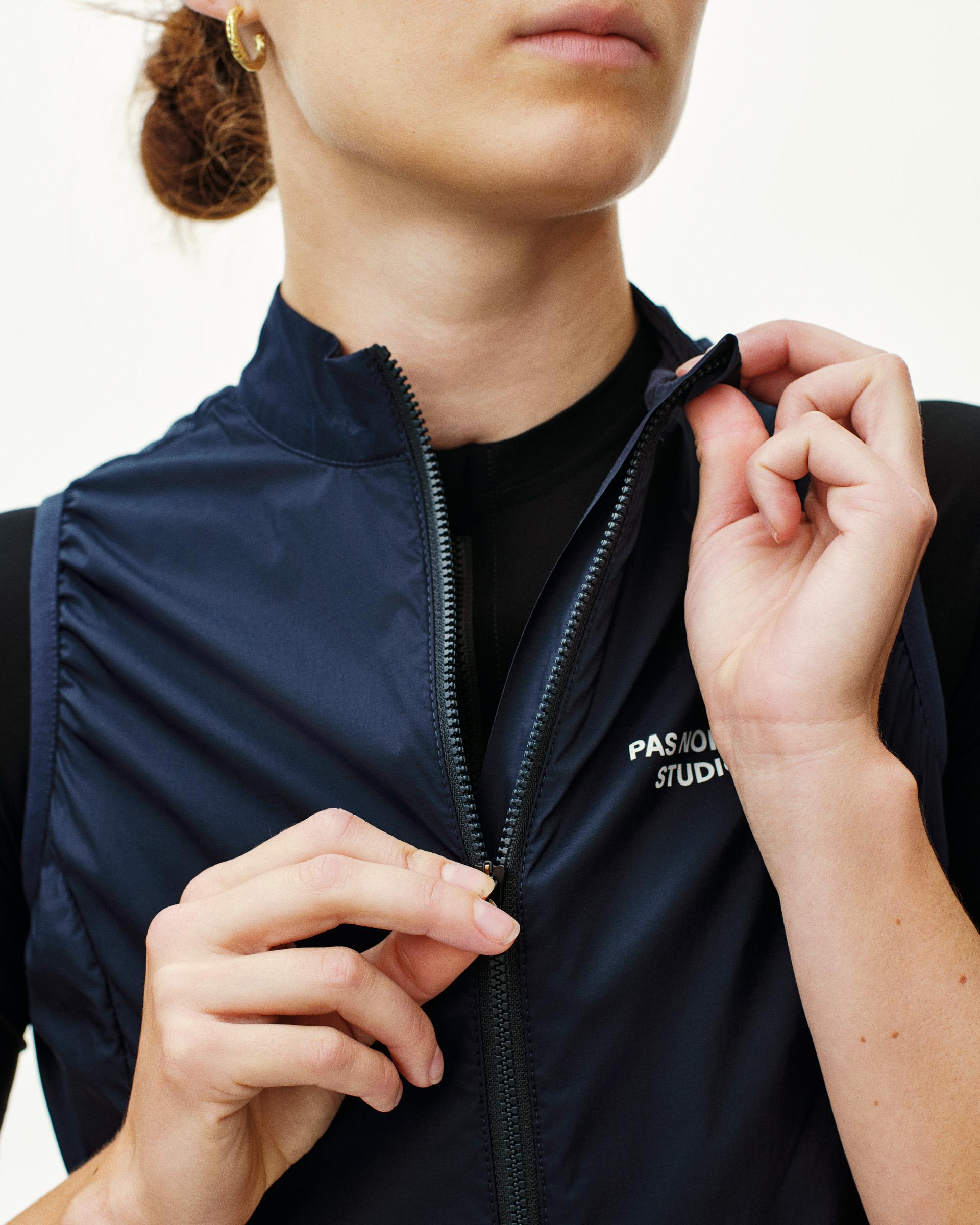 Navy Essential insulated gilet on model with full zip closure