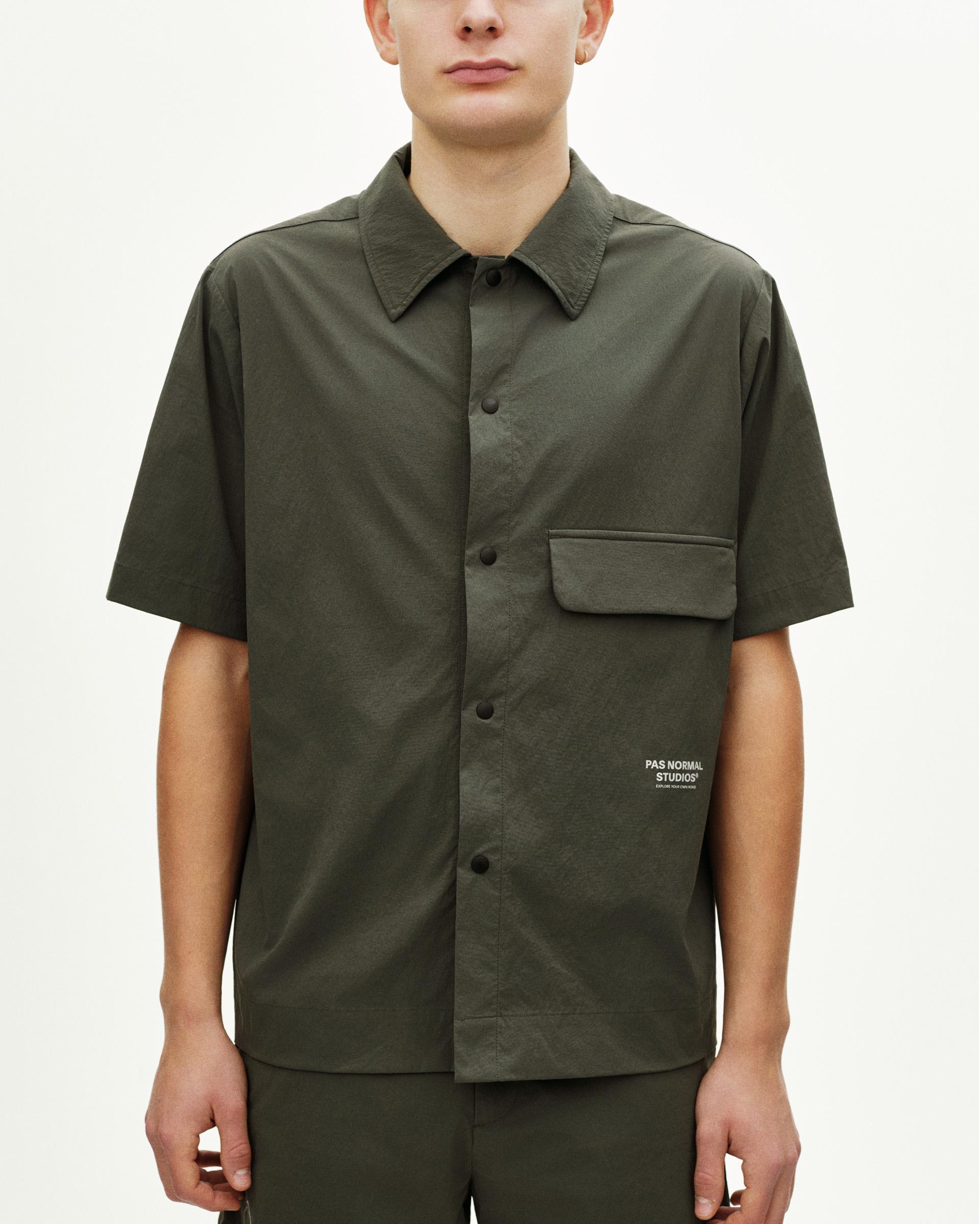 Dark Grey Off-Race Light Tech shirt on model, front view with chest pocket and button closure