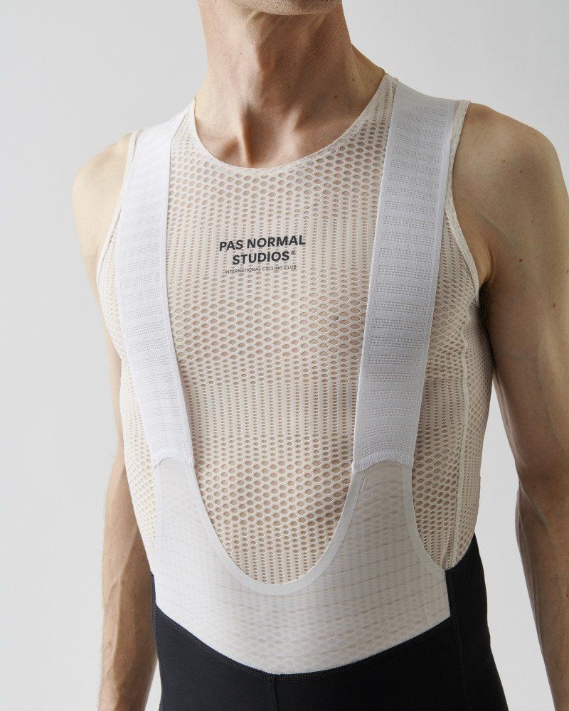 White Mechanism Pro sleeveless cycling base layer on model with mesh panel construction