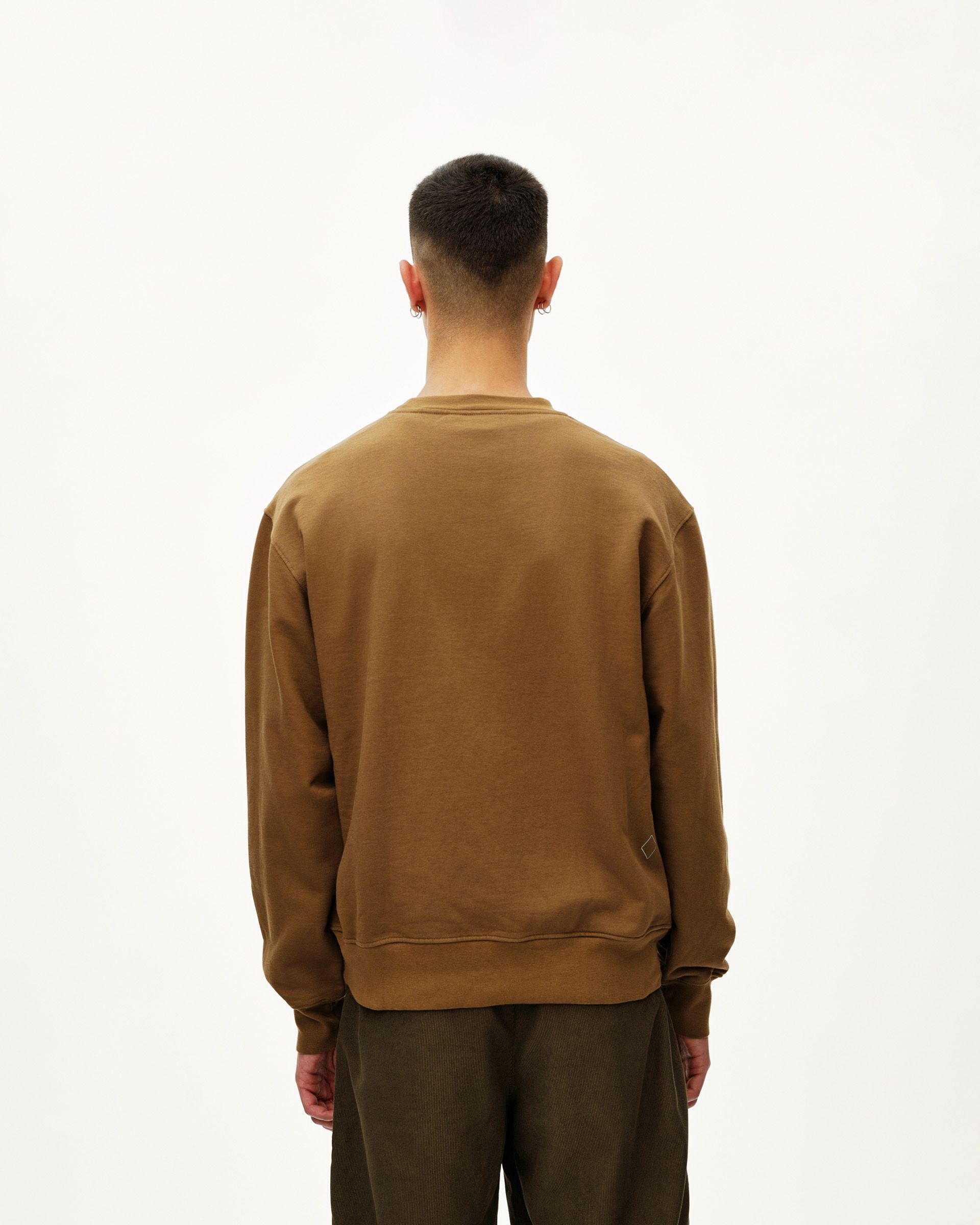 Wood brown Off-Race sweatshirt on model, rear view with ribbed hem and cuffs