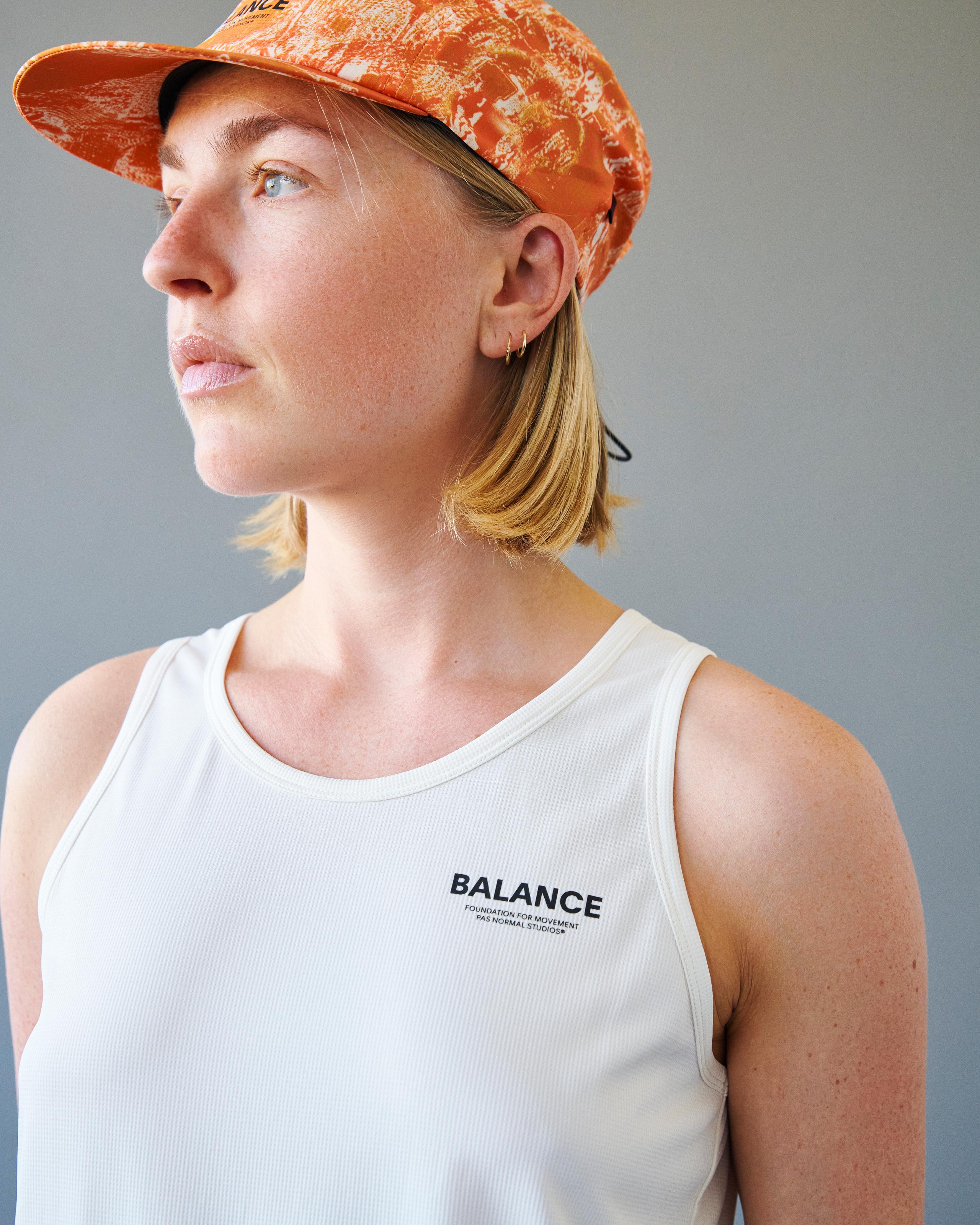 Off White Balance singlet on model with black chest logo