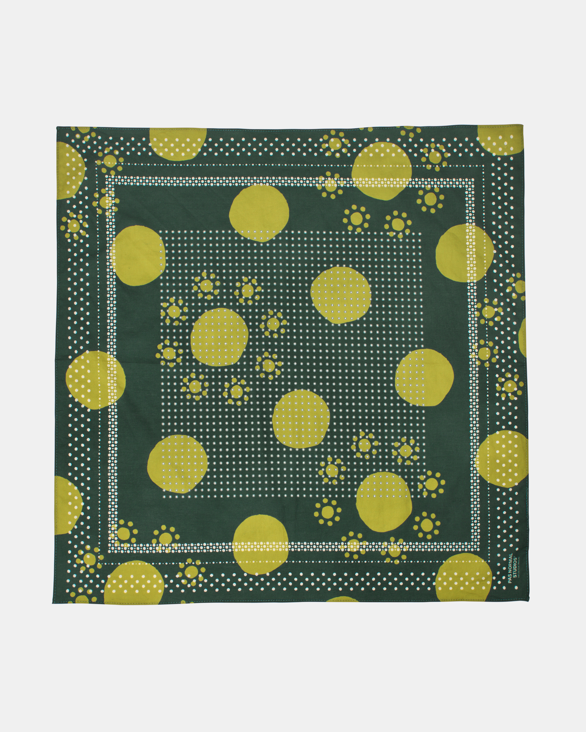 Green Off-Race bandana, flat lay with yellow polka dot pattern