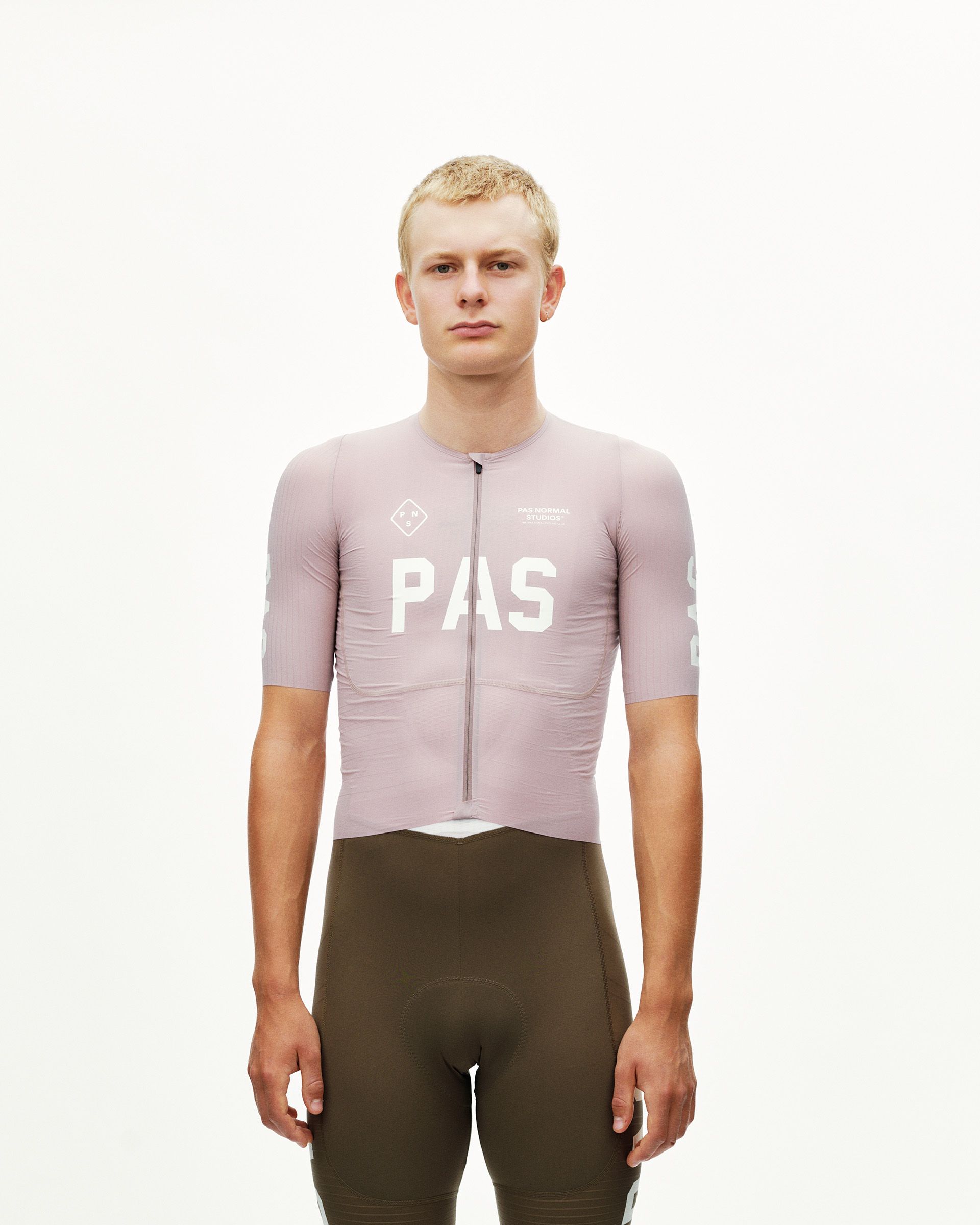 Taupe Rose PAS Mechanism Pro men's cycling jersey on model, front view with white chest logo print
