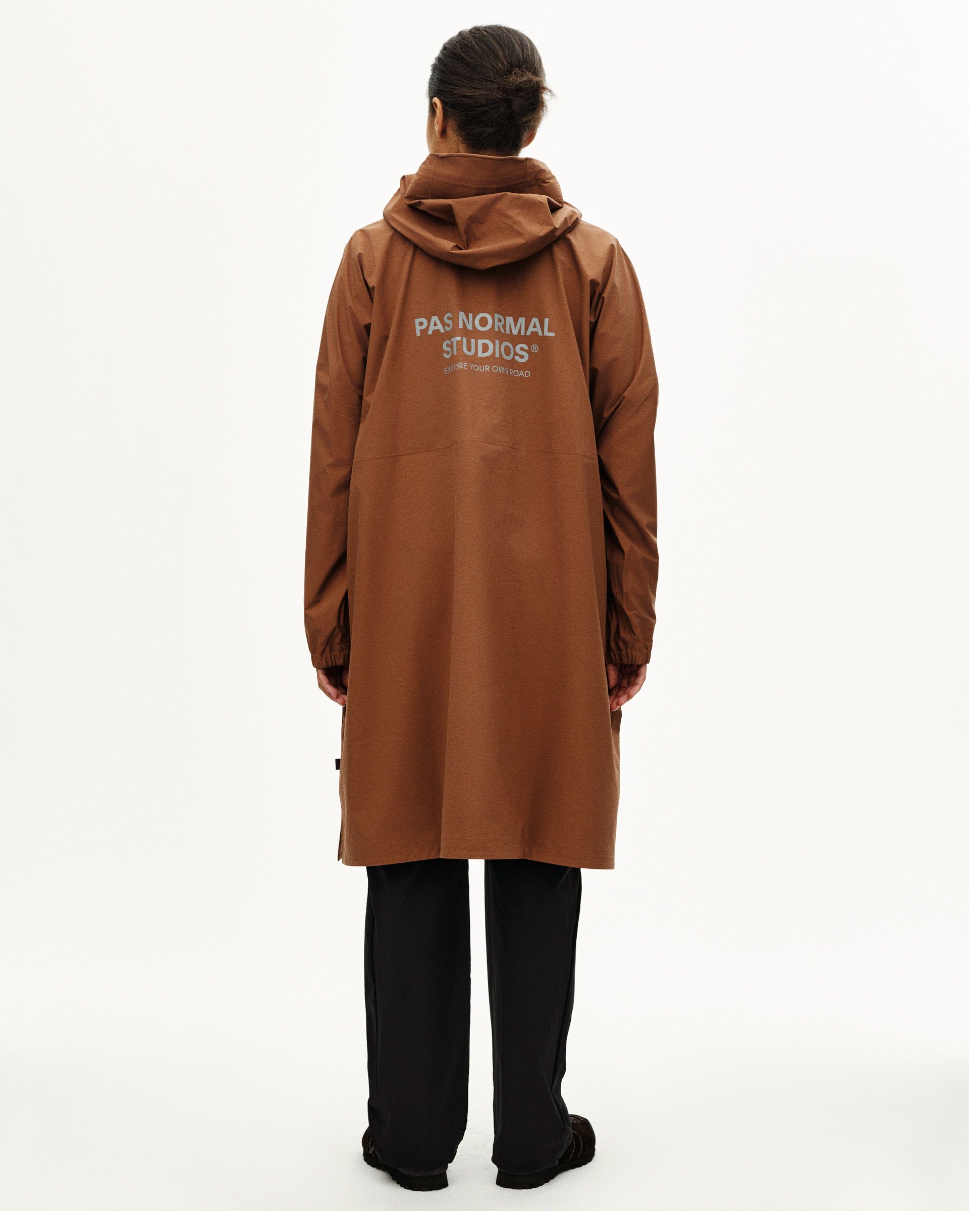 Brown Off-Race 3L Poncho, rear view on model with white logo print