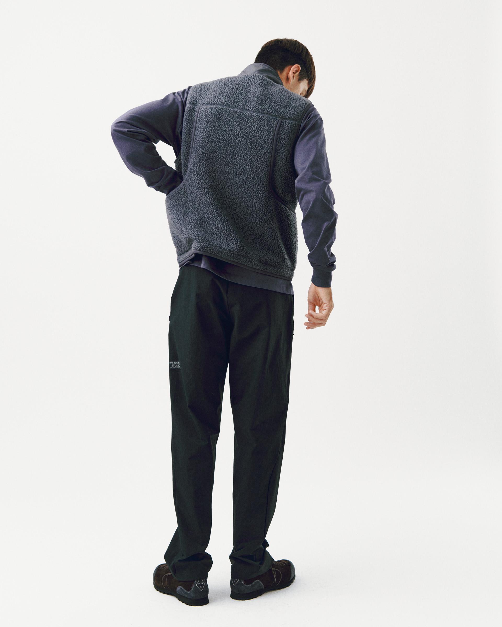 Grey Off-Race Pile Fleece vest, rear view on model with textured fleece body and contrast sleeves