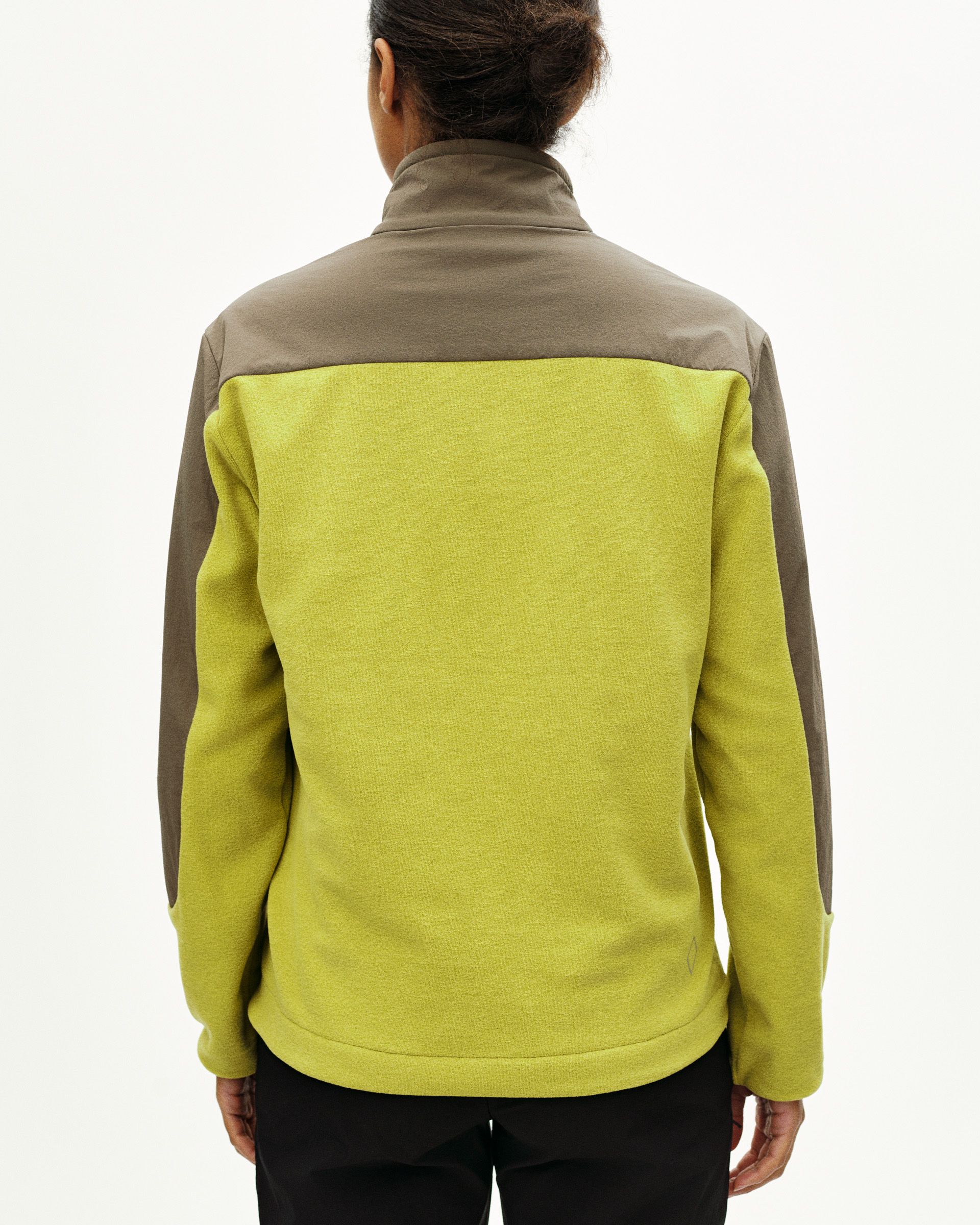 Green Off-Race Light Fleece half-zip, rear view on model with moss green body and olive shoulder panels