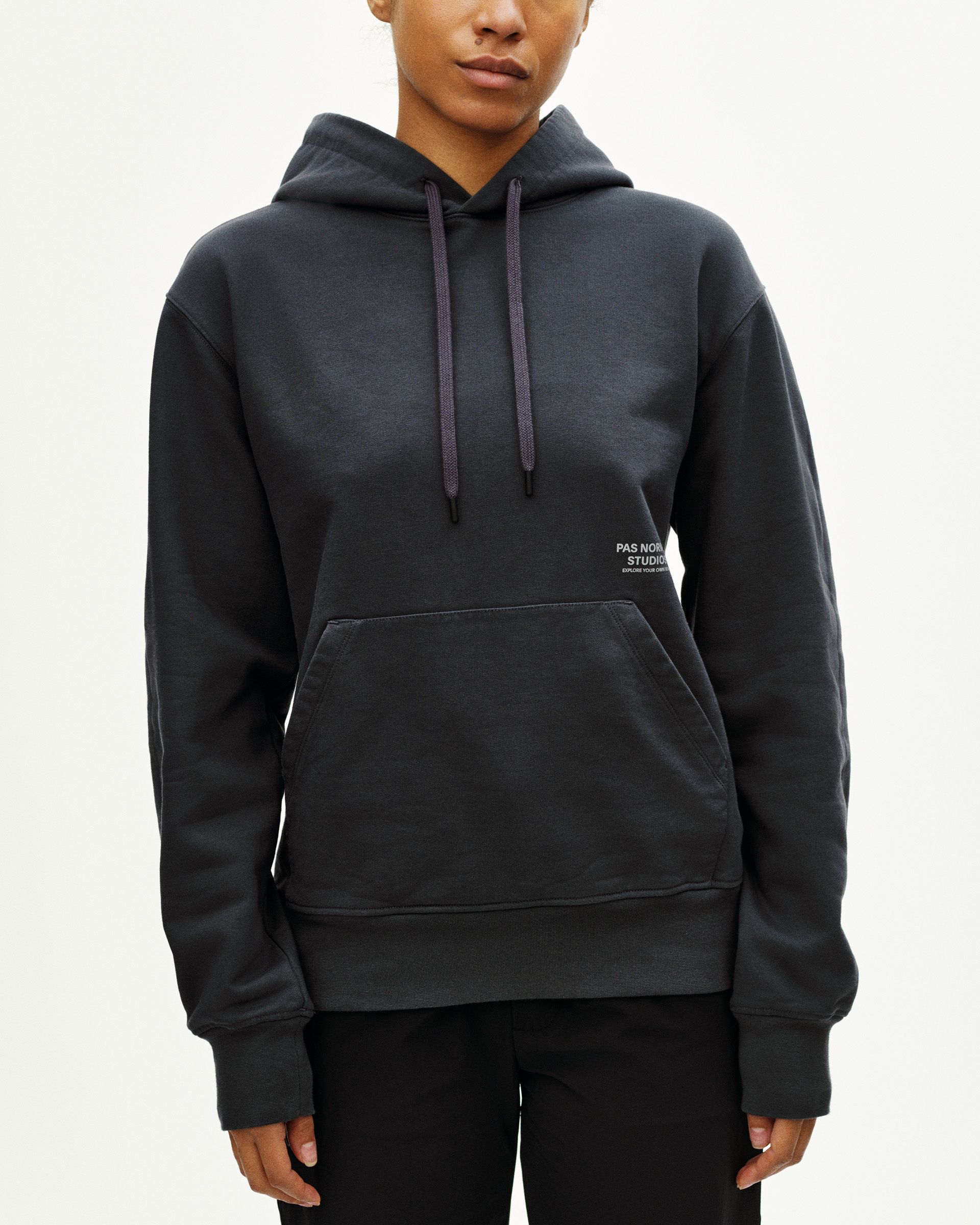 Dark Navy Off-Race Graphic hoodie on model with white chest logo and kangaroo pocket