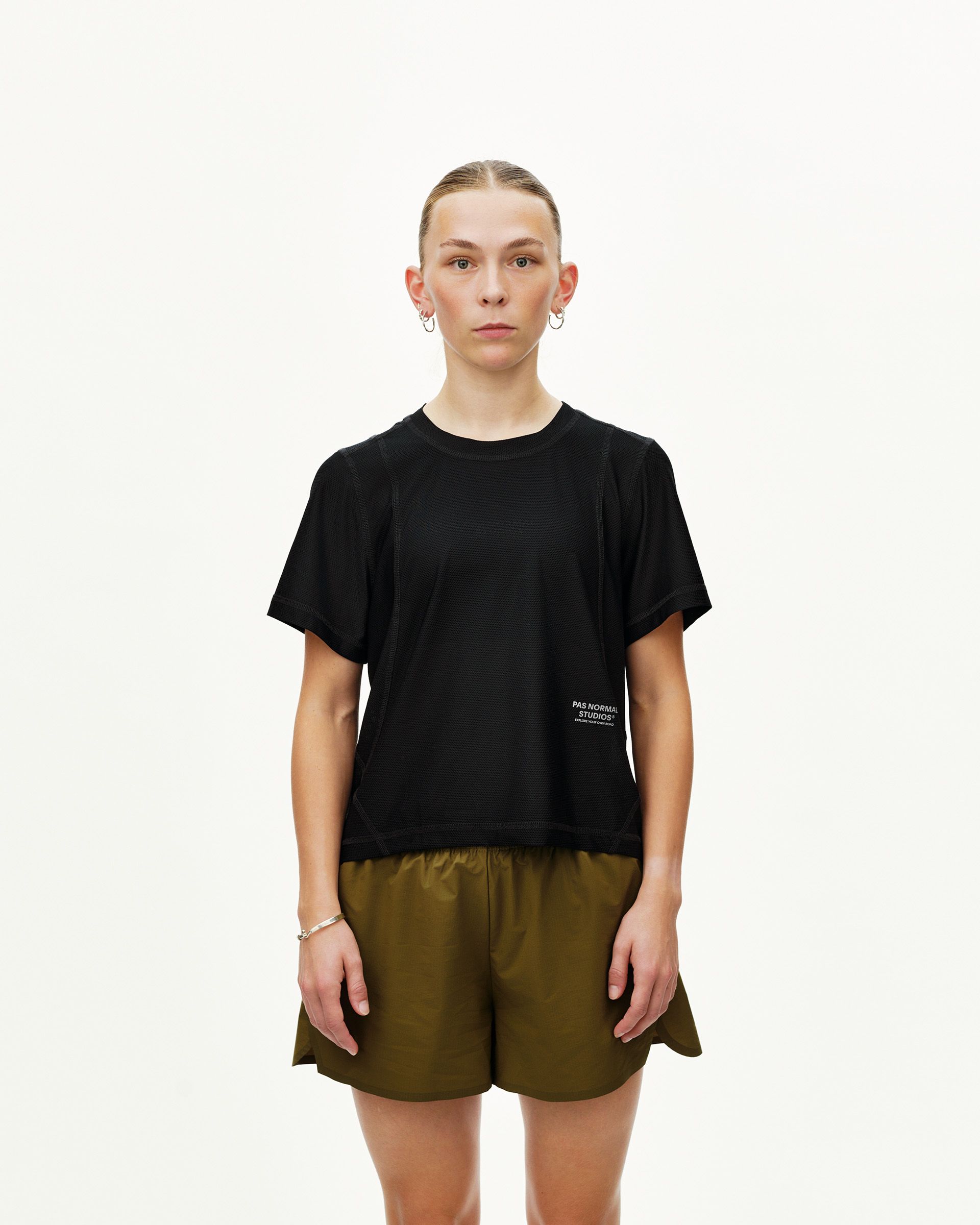 Black Balance T-Shirt on model, front view with contrast stitching and small chest logo print