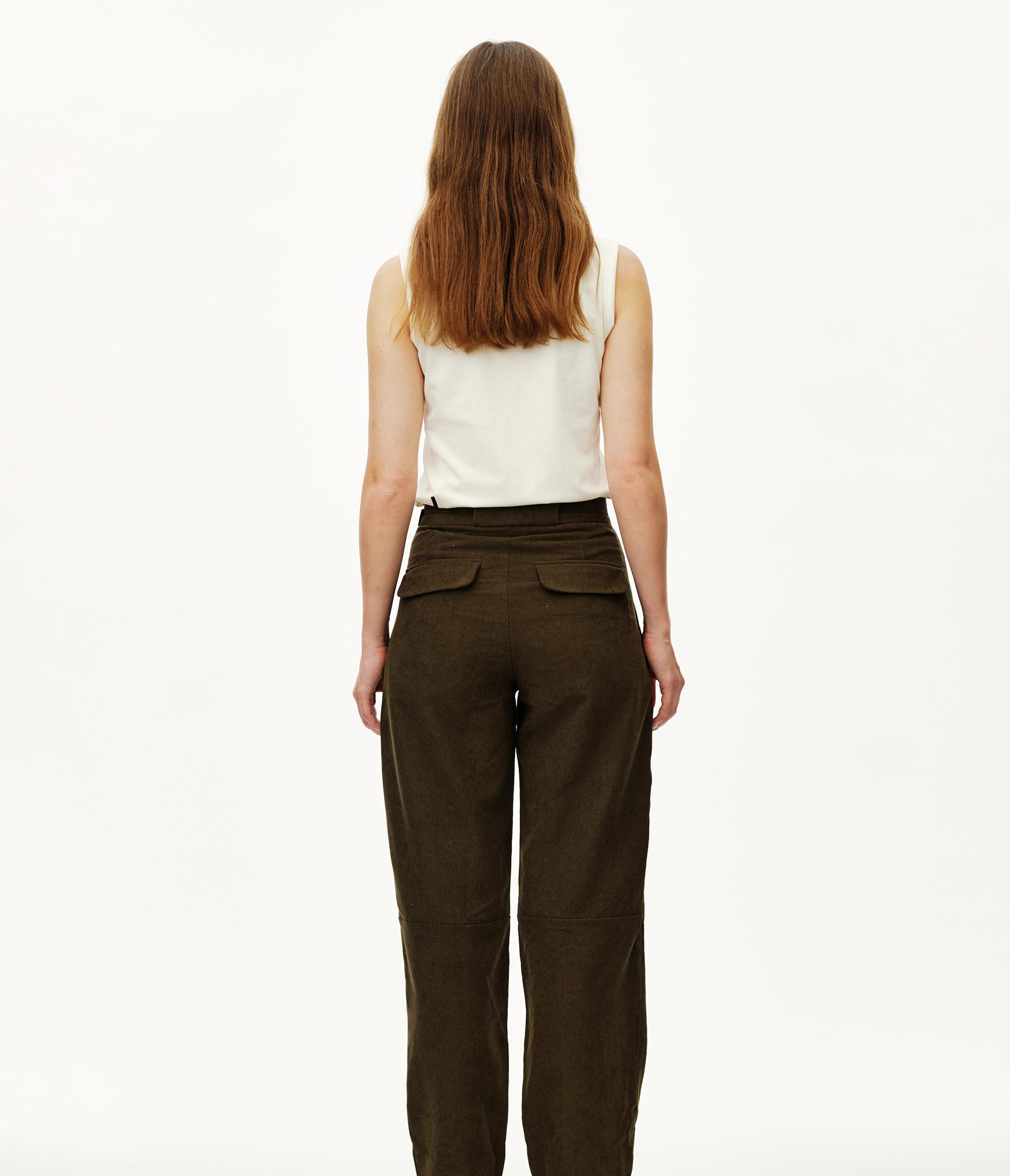 Deep Olive Off-Race Corduroy pants on model, rear view with patch pockets at waist