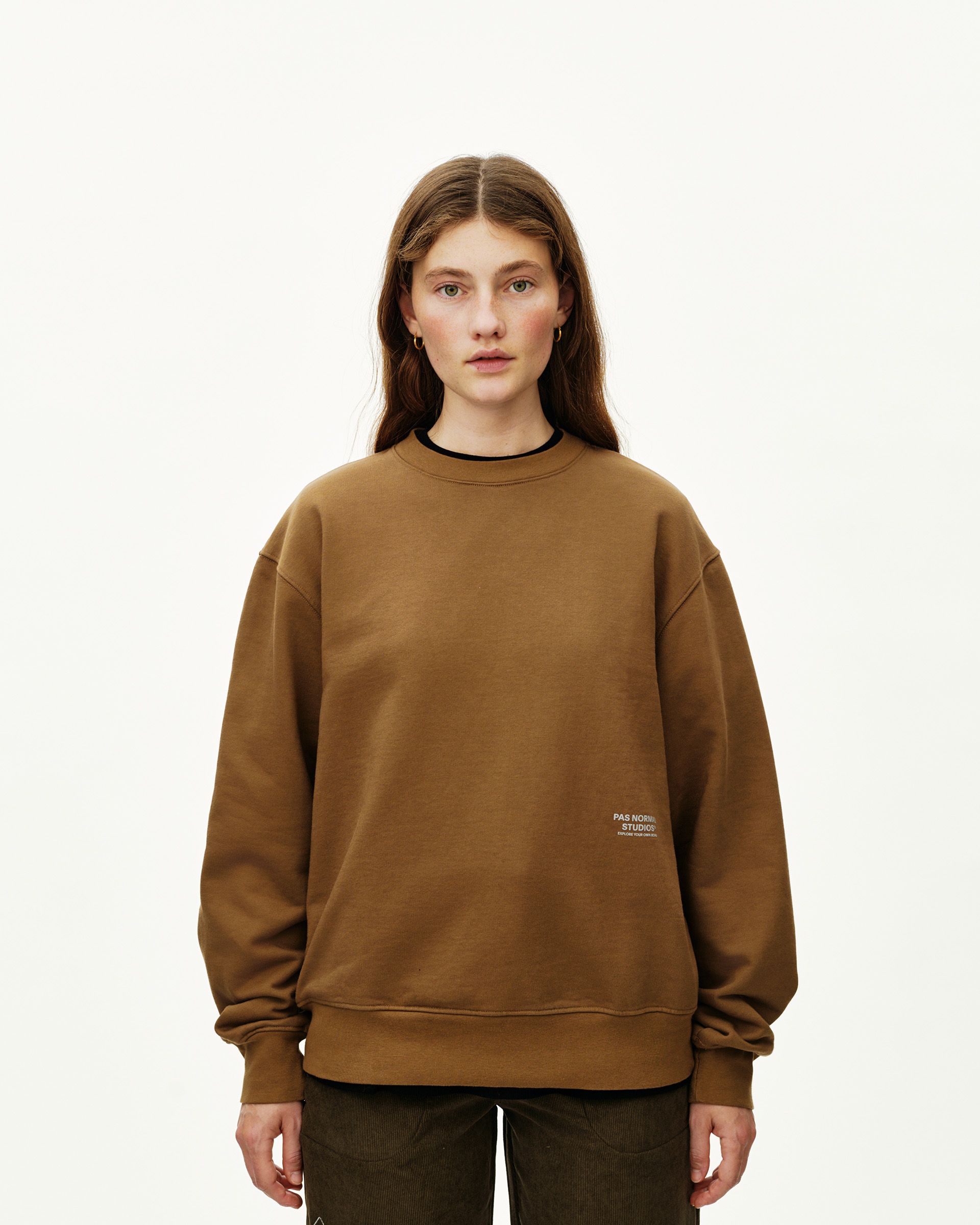 Wood brown Off-Race sweatshirt on model, front view with small chest logo print