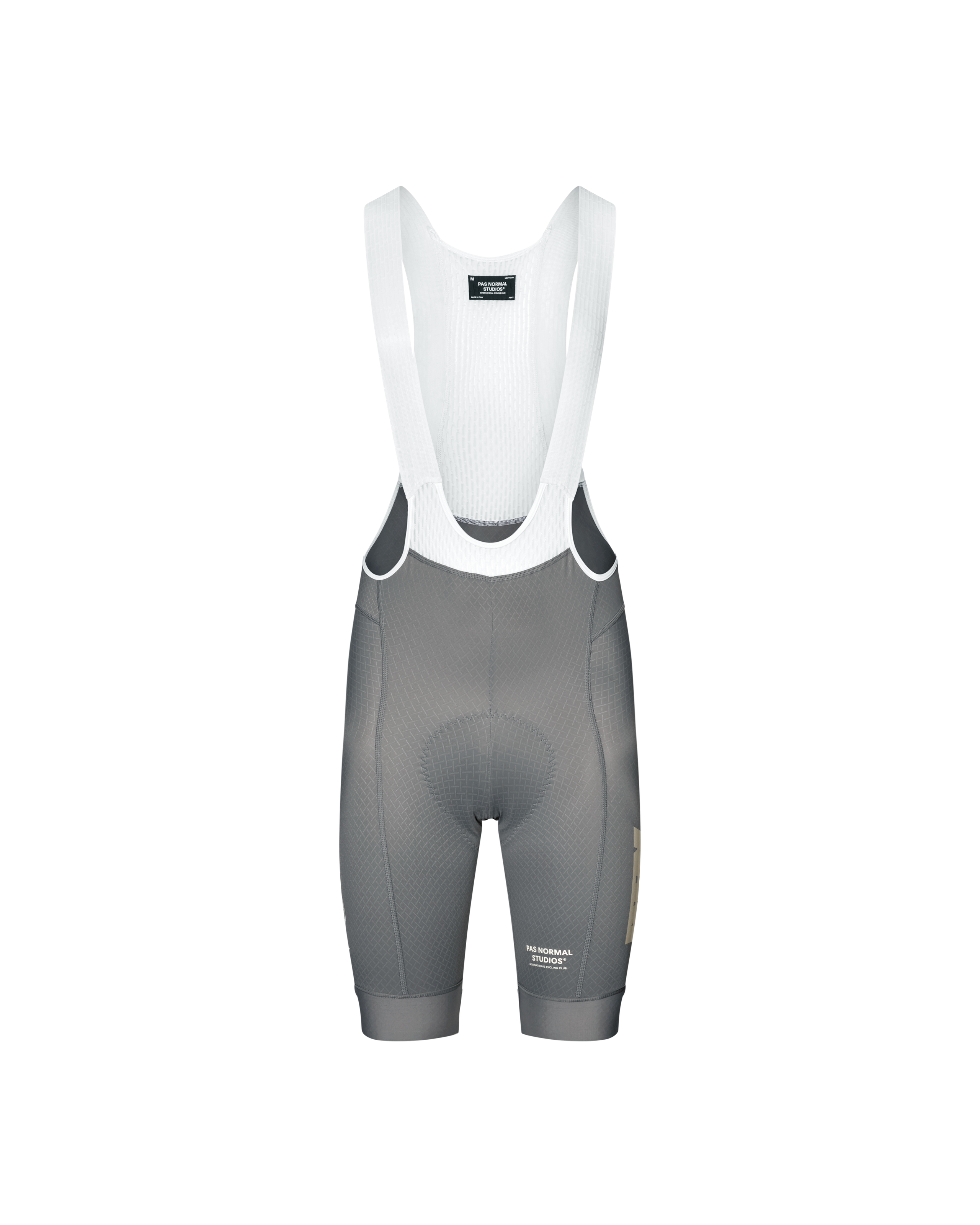Medium Grey Mechanism cycling bibs, front flat lay with white ribbed bib straps and gold side logo