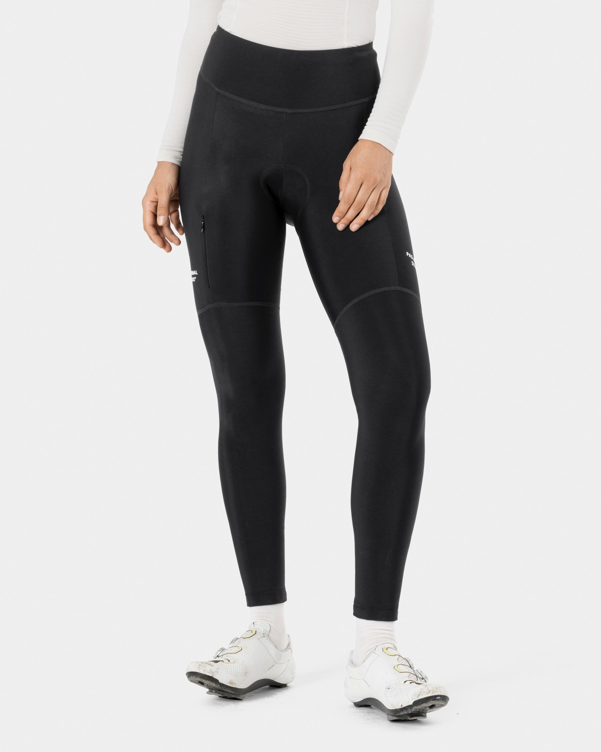 Black Essential thermal long tights on model with high waistband and knee panels