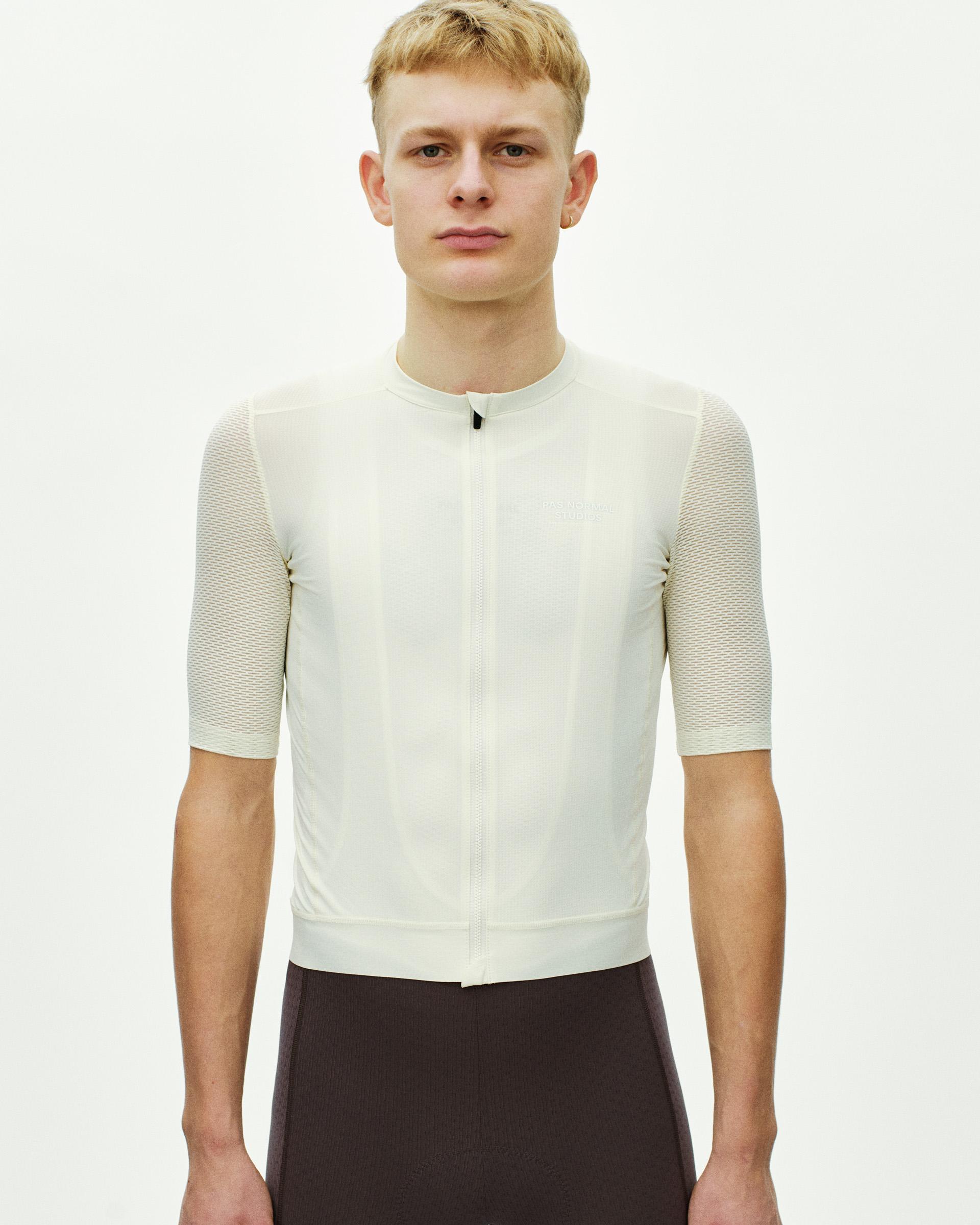 Off White Essential Light cycling jersey on model, front view with textured sleeves