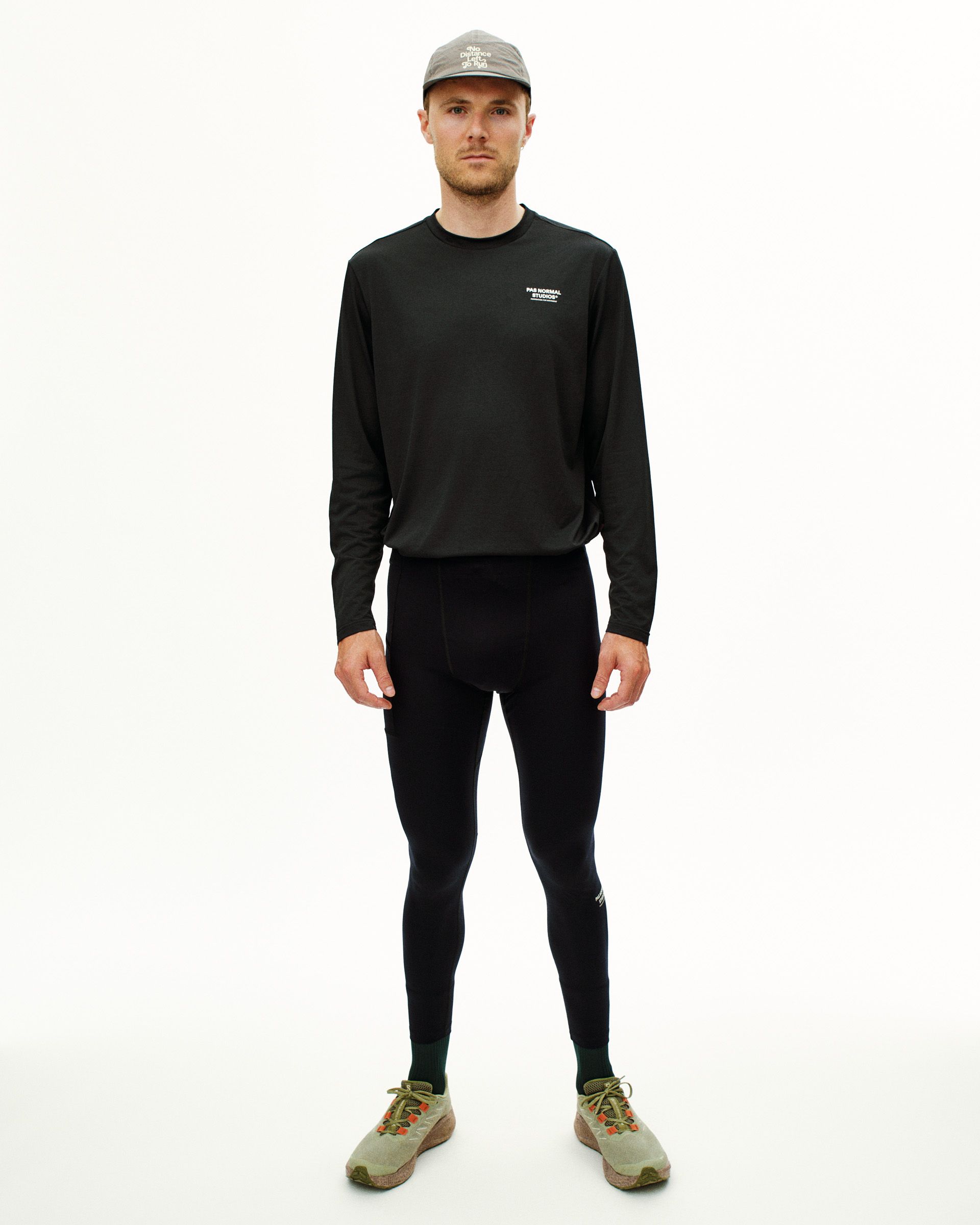 Black Balance long tights on model, front view with elastic waistband