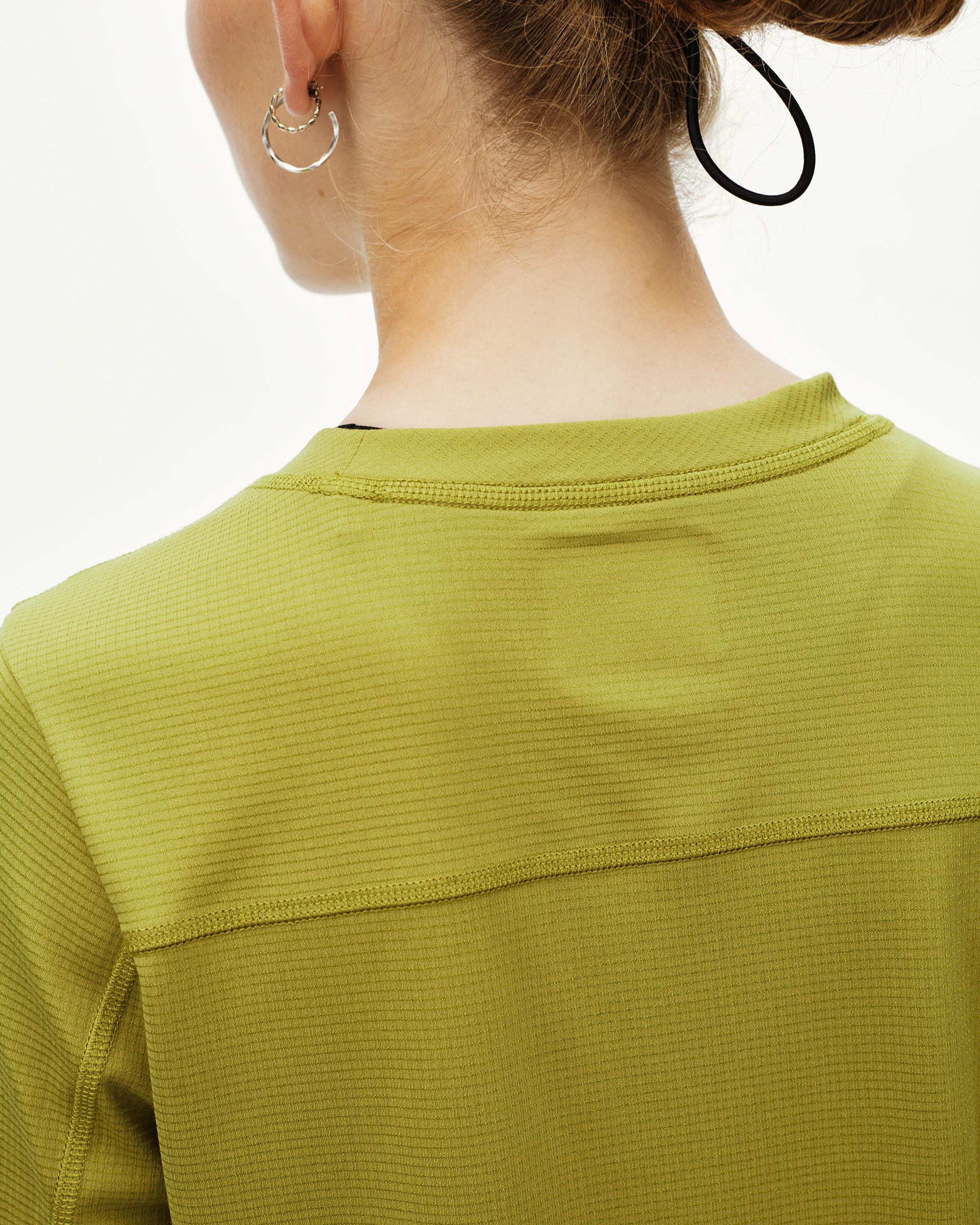 Dark Lime green Balance women's long sleeve T-shirt, rear detail on model with ribbed texture and contrast neckline seam