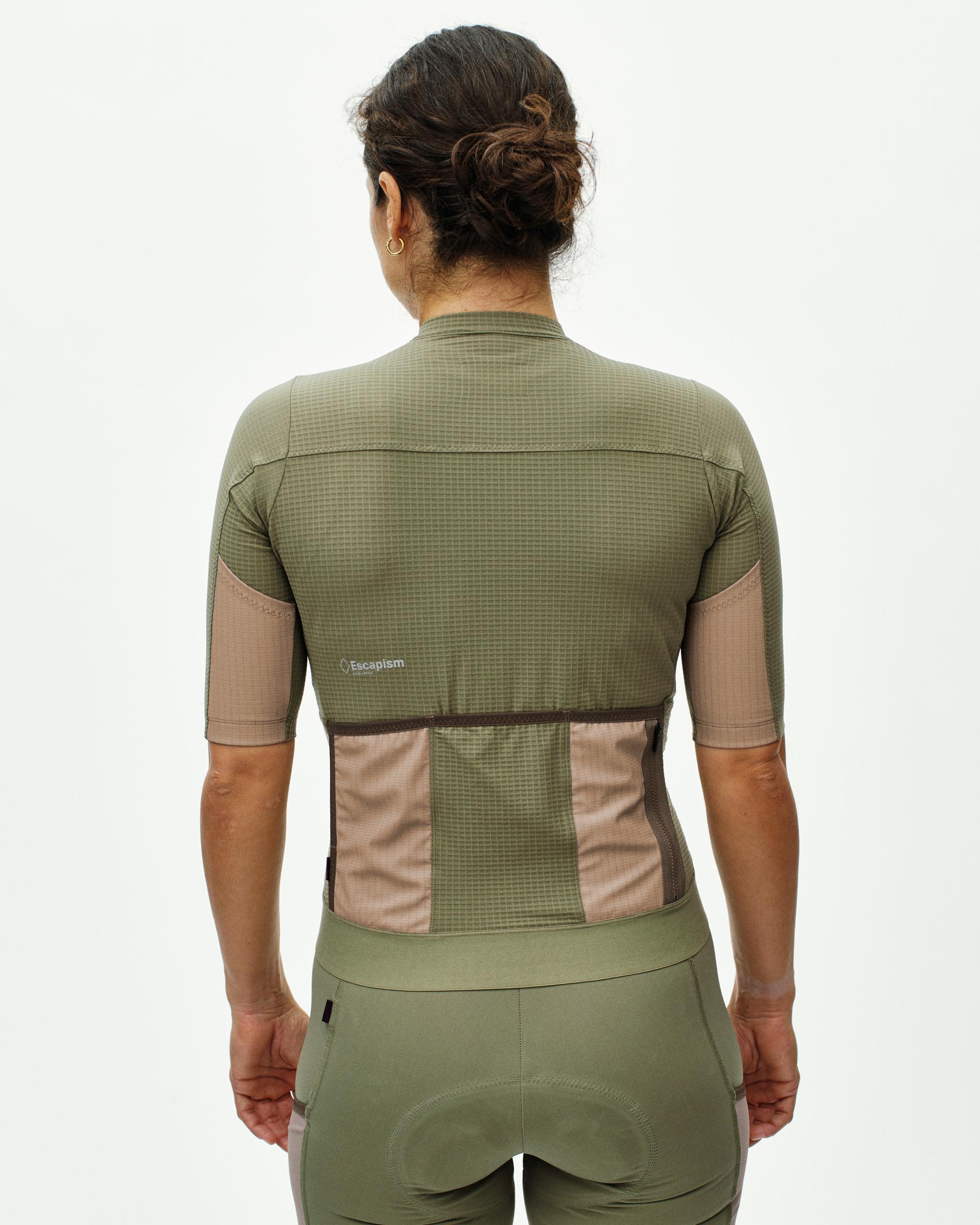 Light Olive Escapism cycling jersey, rear view on model with contrast tan side panels