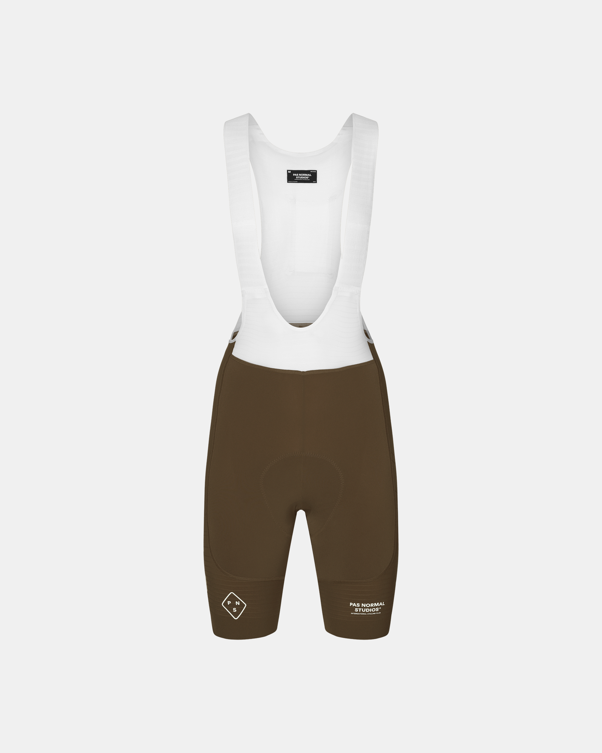Dark Earth brown PAS Mechanism Pro cycling bibs, front flat lay with white mesh bib panel and logo hem print