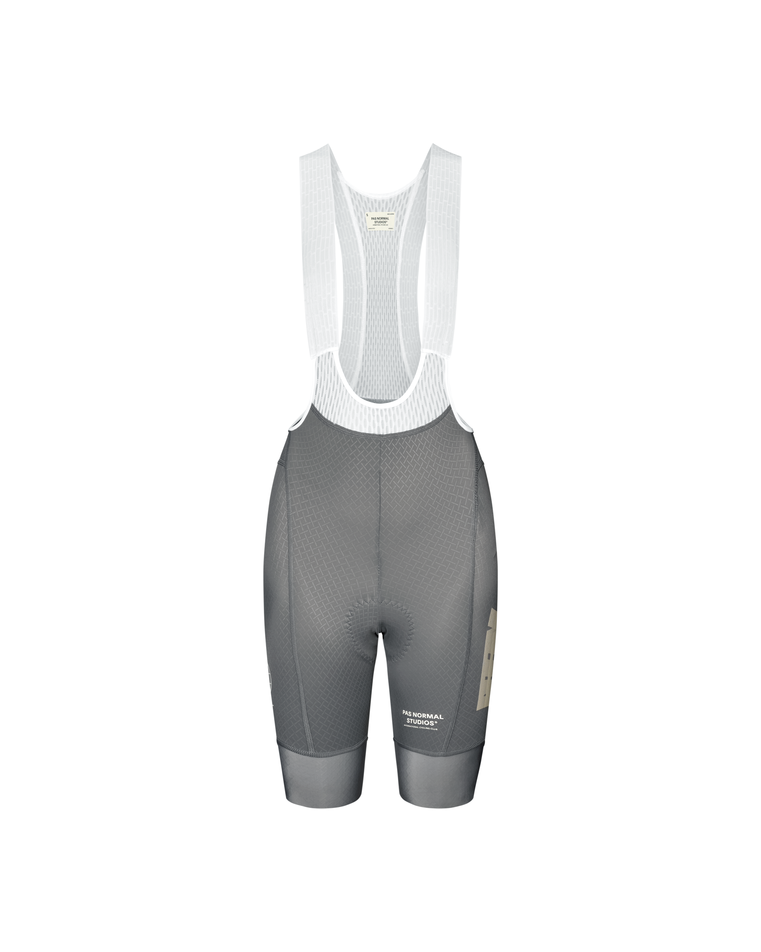 Medium Grey Mechanism women's cycling bib shorts, front flat lay with white mesh straps and tan side panel logo