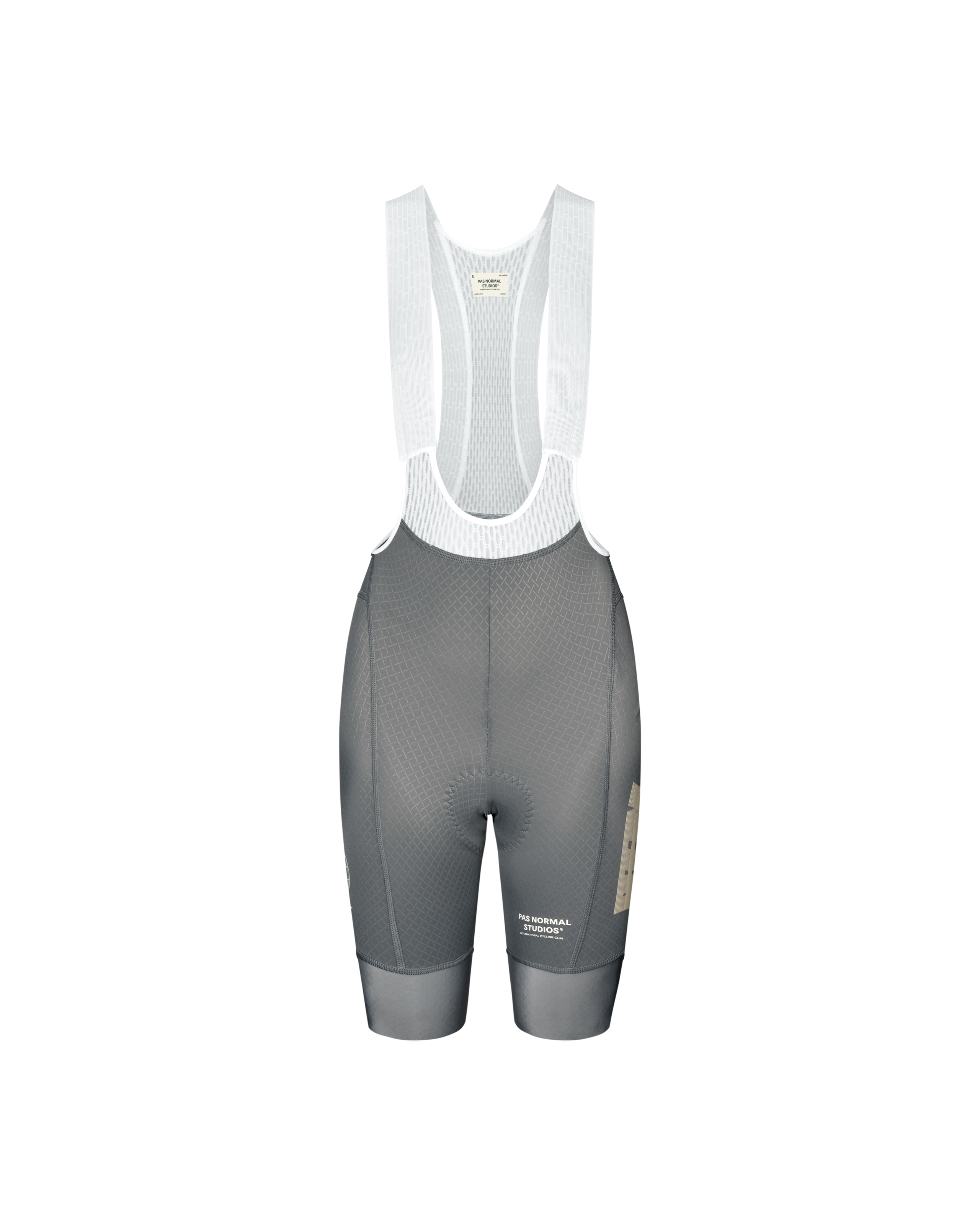 Medium Grey Mechanism women's cycling bib shorts, front flat lay with white mesh straps and tan side panel logo