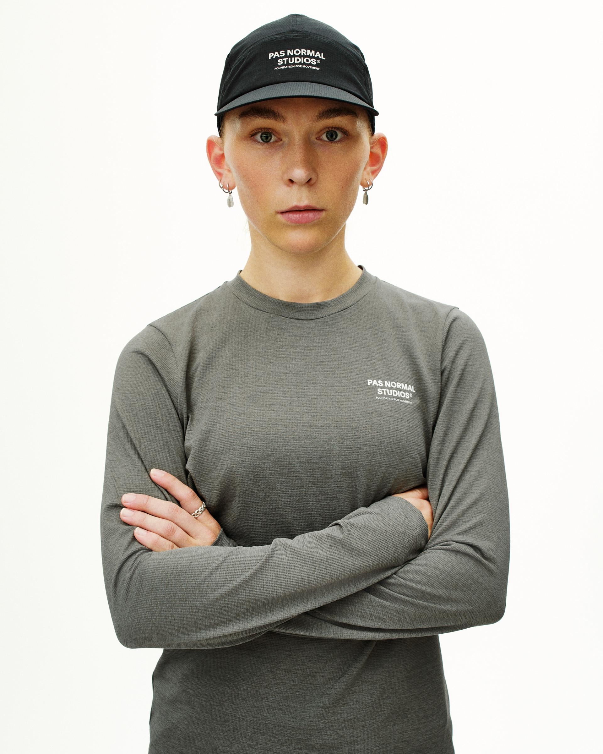 Grey Balance long sleeve t-shirt on model with white chest logo