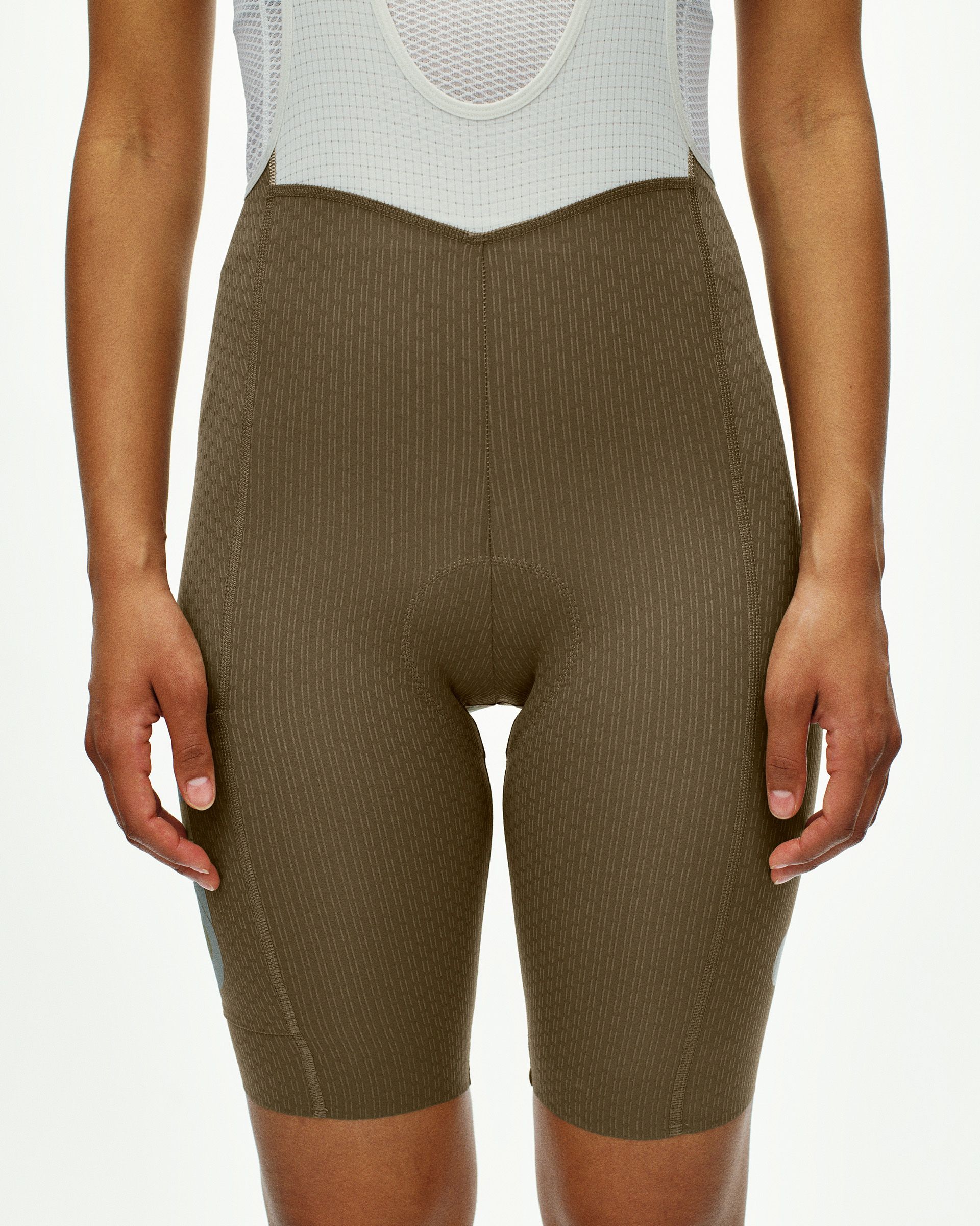 Dark Stone T.K.O. Essential Light Cargo bibs, front view on model with ribbed fabric and high waistband