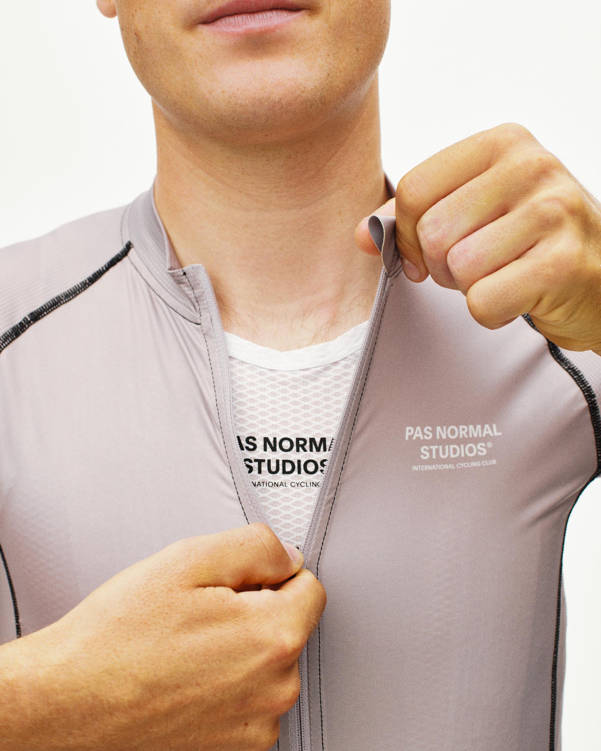 Haze Mechanism cycling jersey on model with half zip and mesh base layer