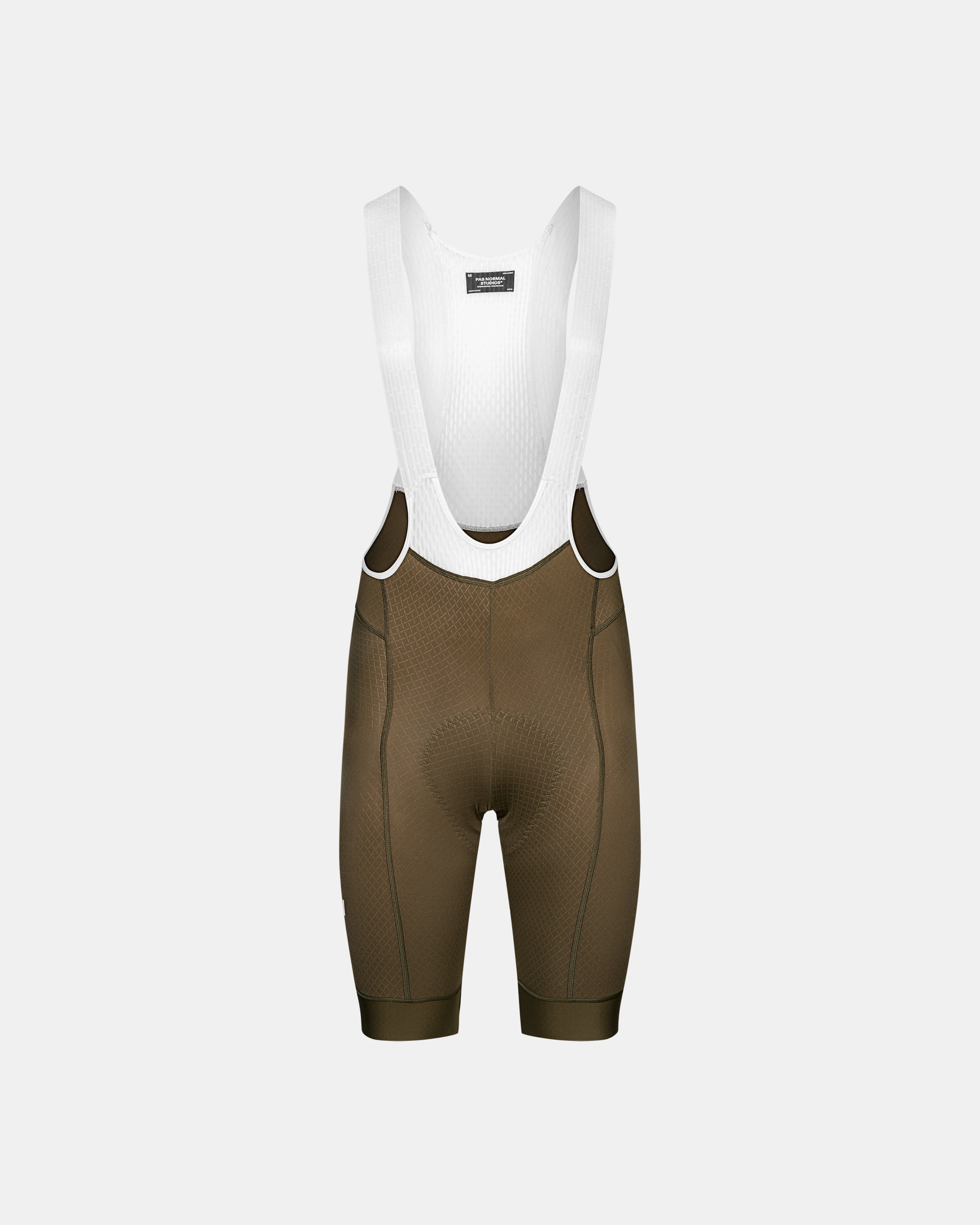 Brown Mechanism cycling bibs, front flat lay with white mesh bib straps