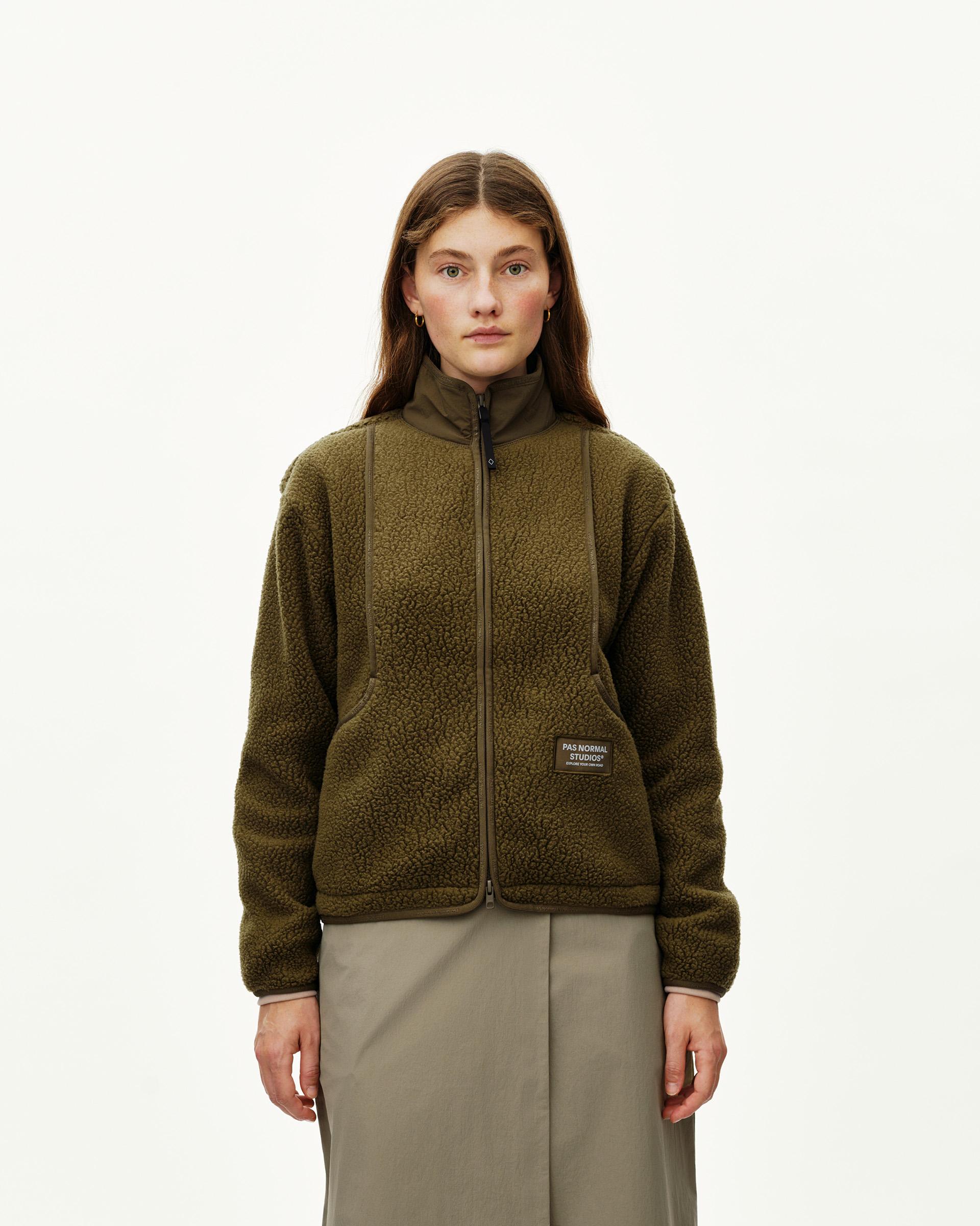 Deep Olive Off-Race Pile Fleece jacket on model, front view with full zip and branded patch pocket