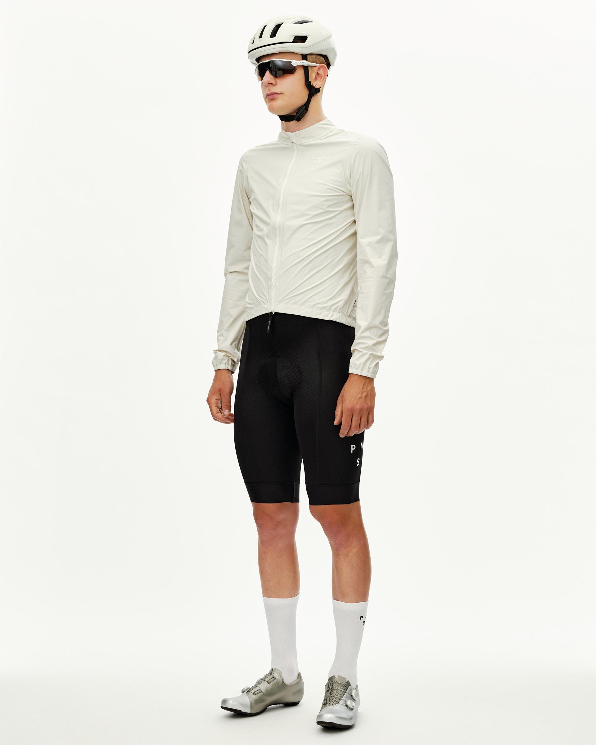 Off White Mechanism cycling rain jacket on model, three-quarter front view with full zip
