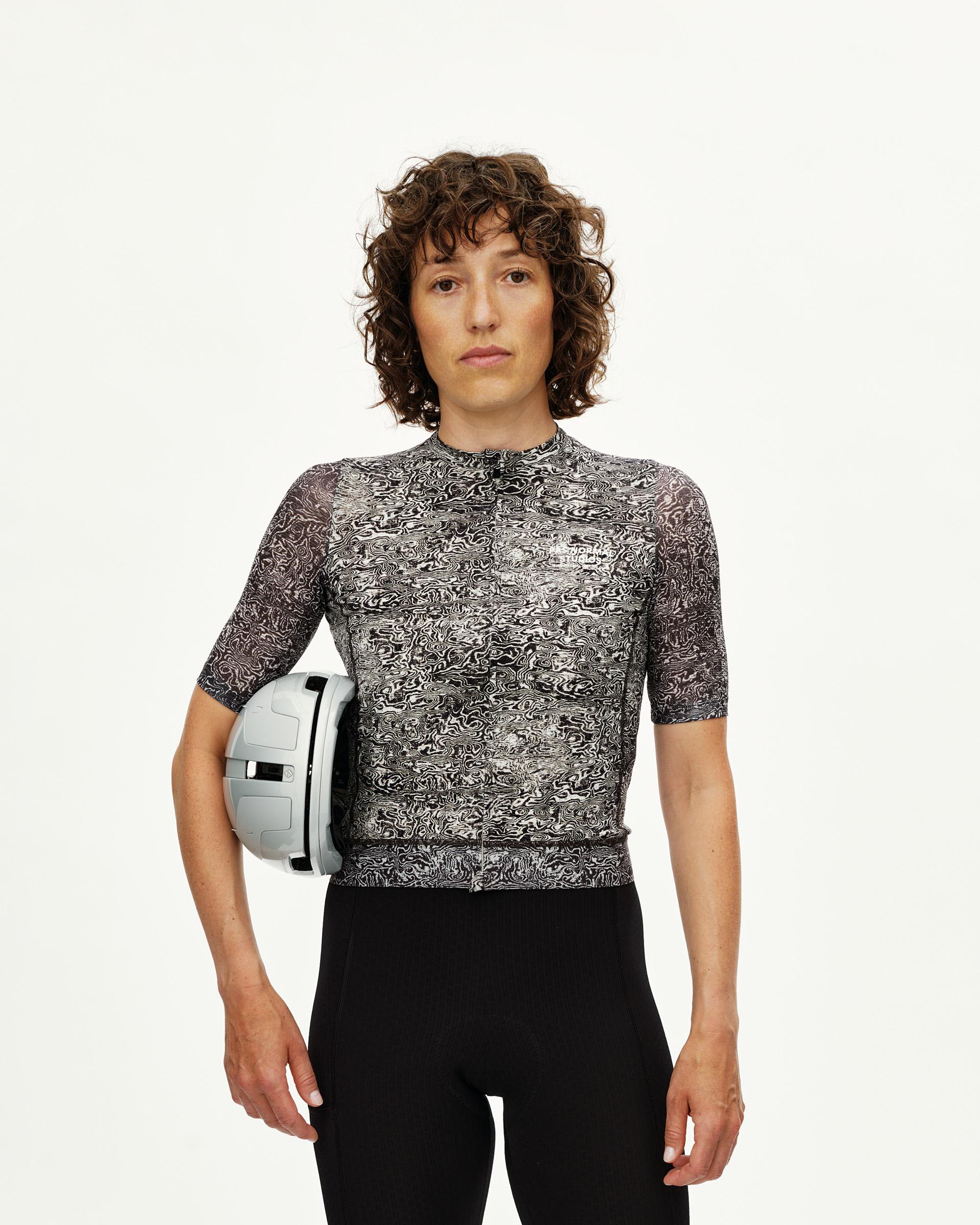 Off White Essential Light women's cycling jersey, front view on model with black and white all-over wave print