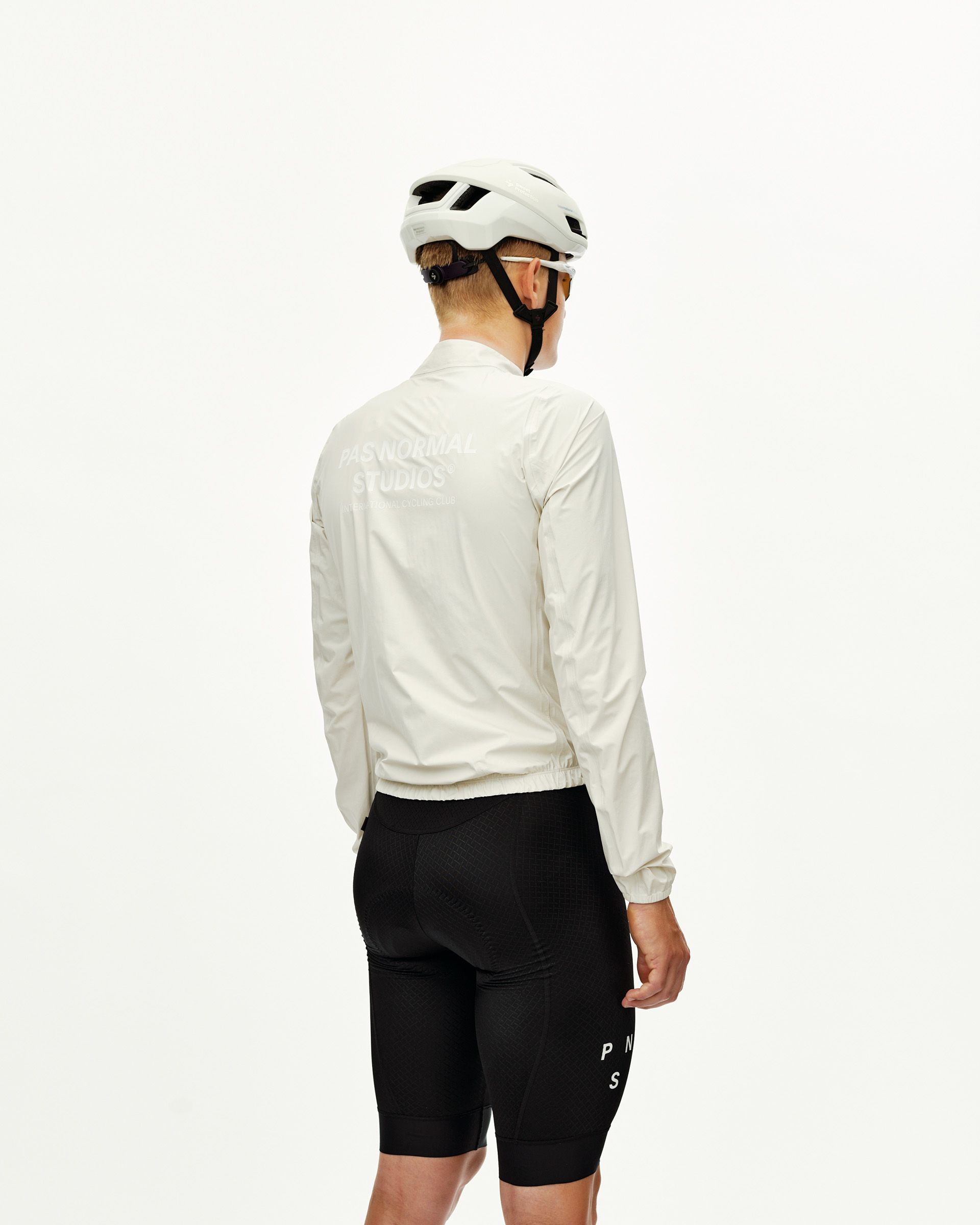 Off White Mechanism cycling rain jacket on model, rear view with back logo print
