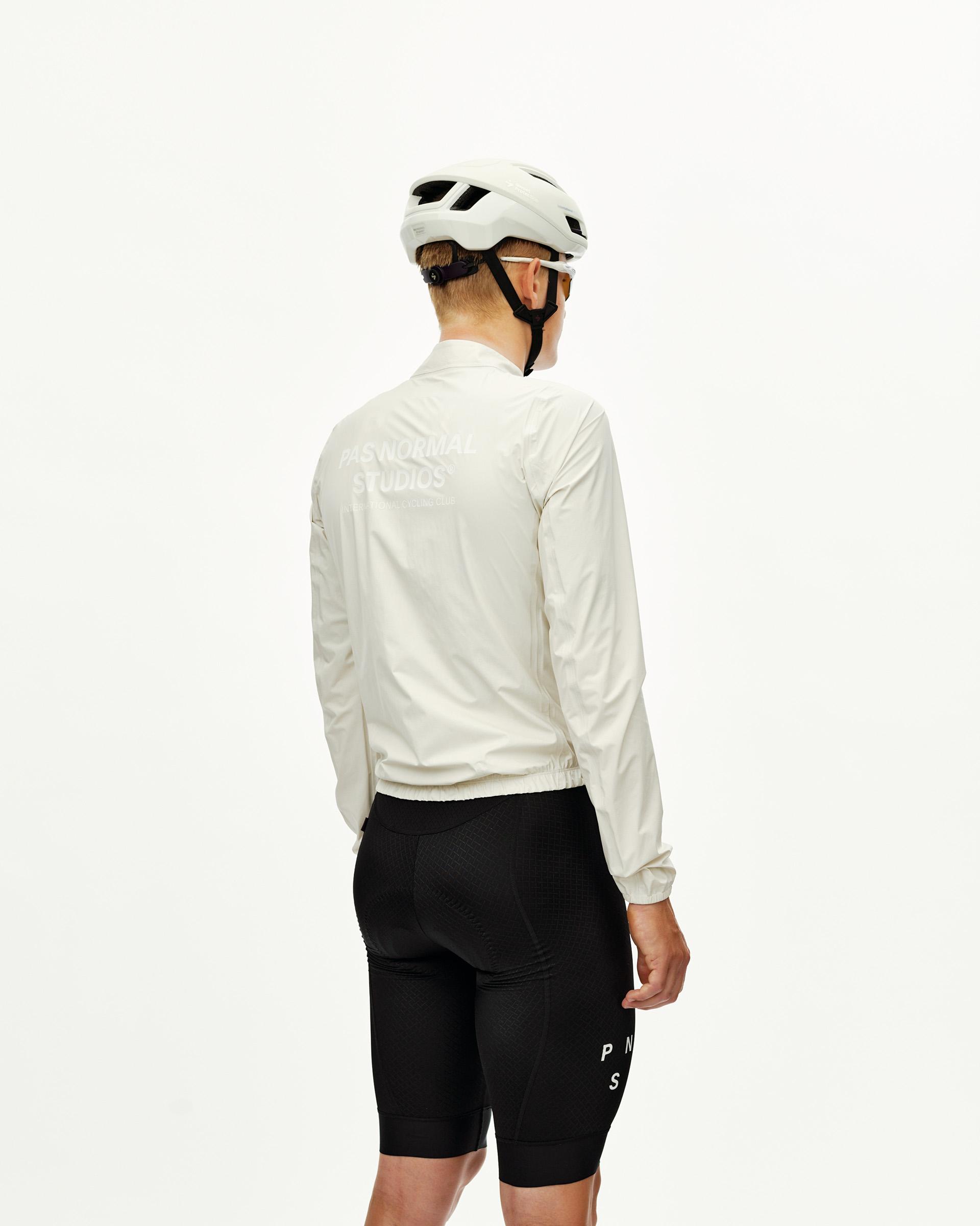 Off White Mechanism cycling rain jacket on model, rear view with back logo print