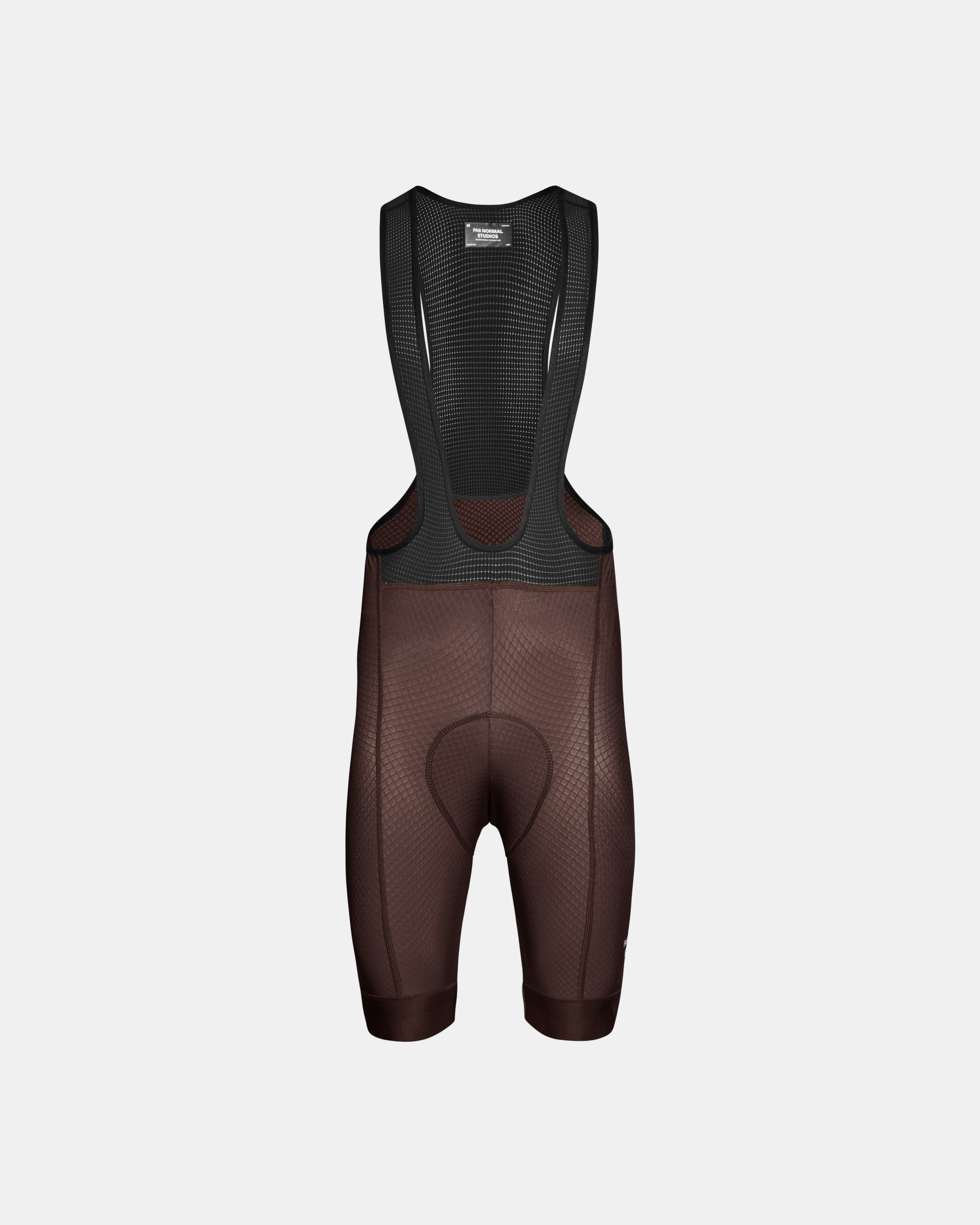 Light Brown Essential cycling bibs, front flat lay with mesh bib and chamois pad