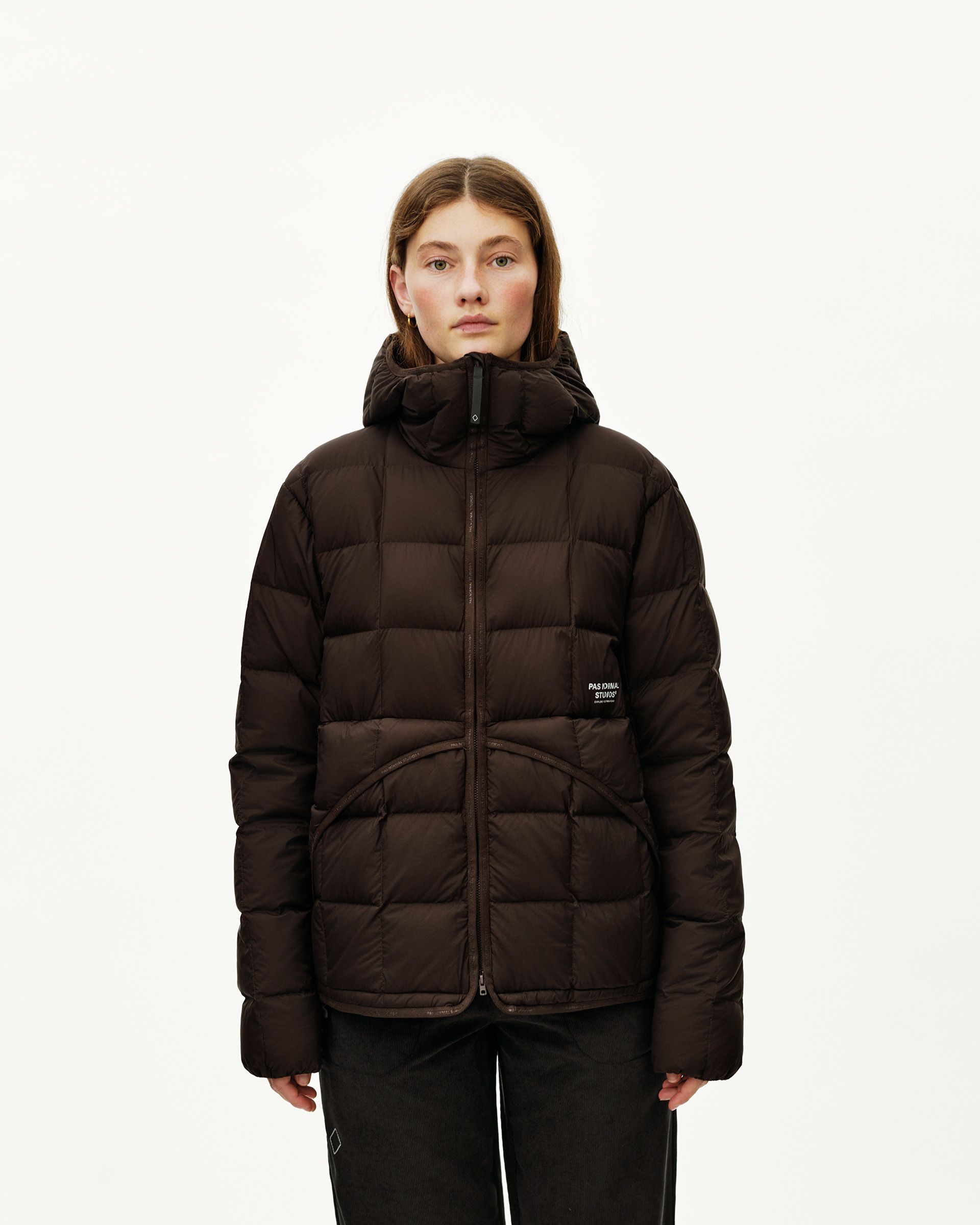 Dark Coffee brown Off-Race Down Liner jacket on model, front view with box quilting and full zip hood