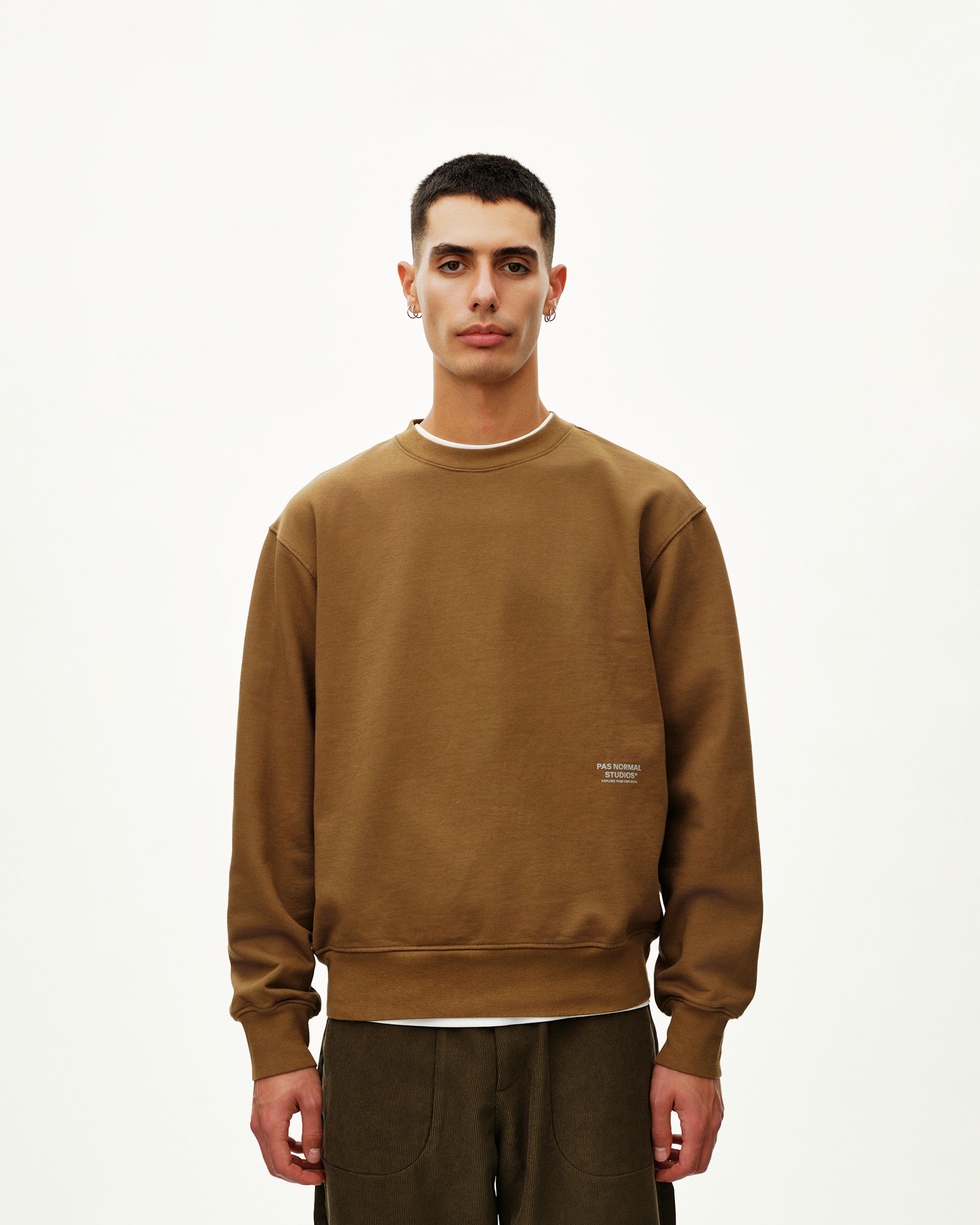 Wood brown Off-Race sweatshirt on model, front view with small chest logo print
