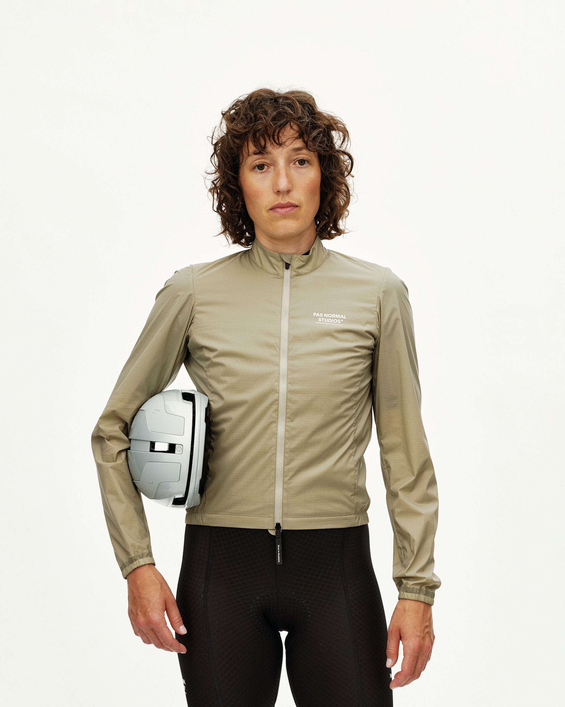 Grey Sage Essential Insulated cycling jacket on model, front view with full zip and white chest logo