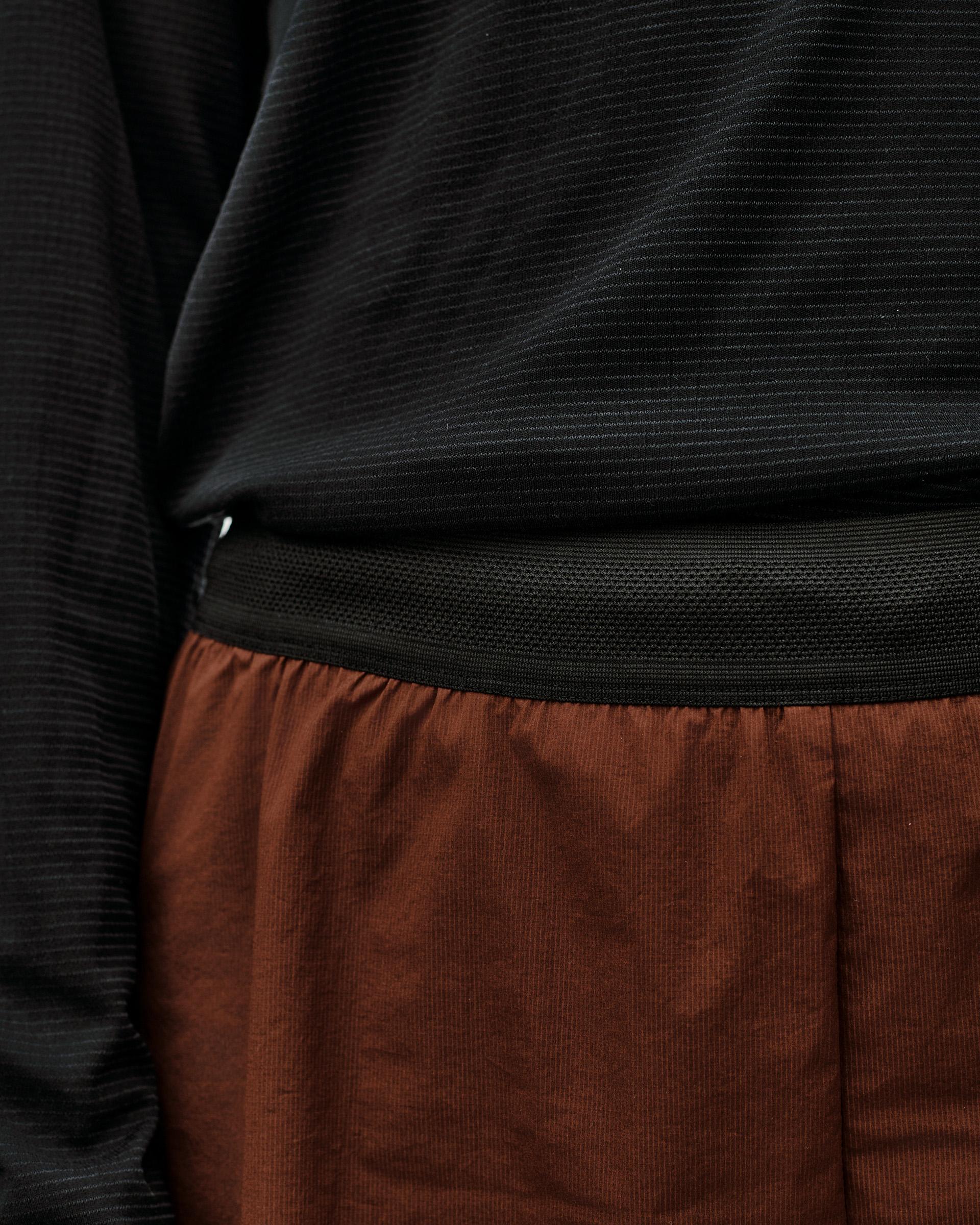 Maroon Brown Balance 2-in-1 shorts, detail view showing elastic waistband and inner liner hem