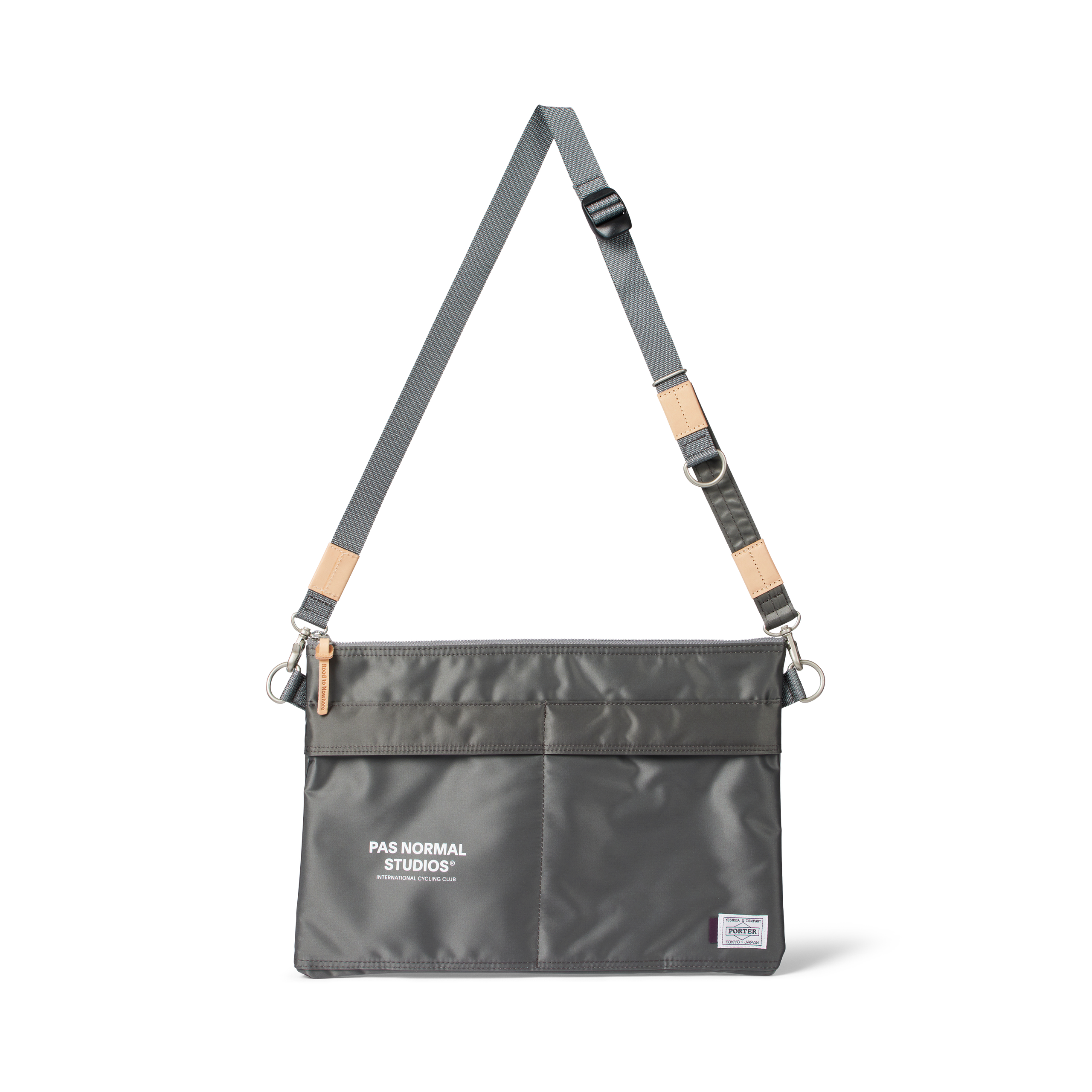 Grey Porter-Yoshida musette, front view with adjustable shoulder strap and tan leather trim