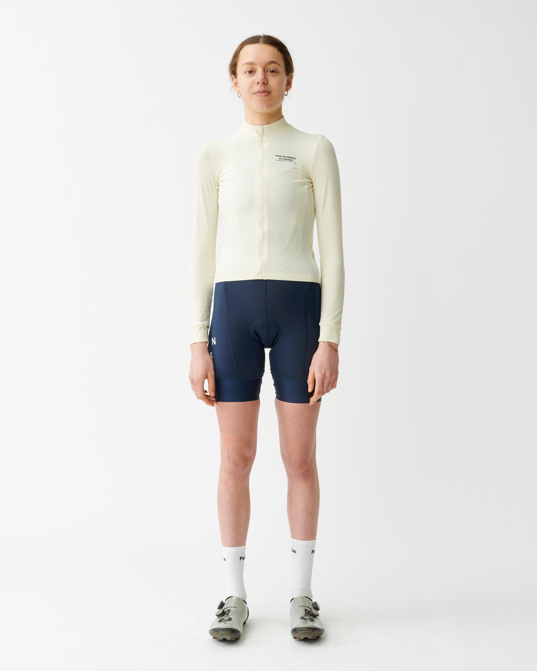 Navy Mechanism bibs on model, full front view with high waistband and shoulder straps
