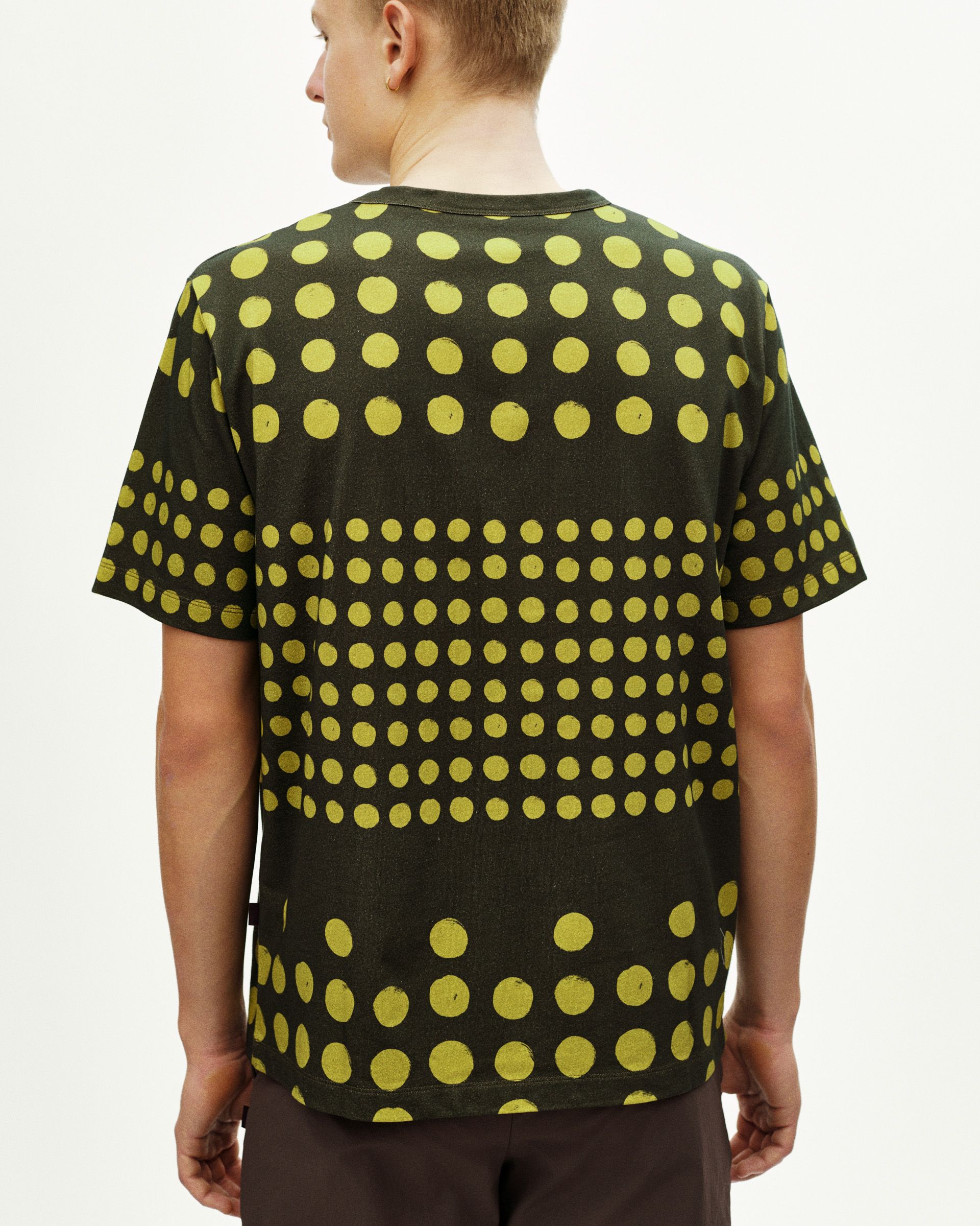Brown Off-Race Graphic t-shirt on model, rear view with yellow polka dot pattern