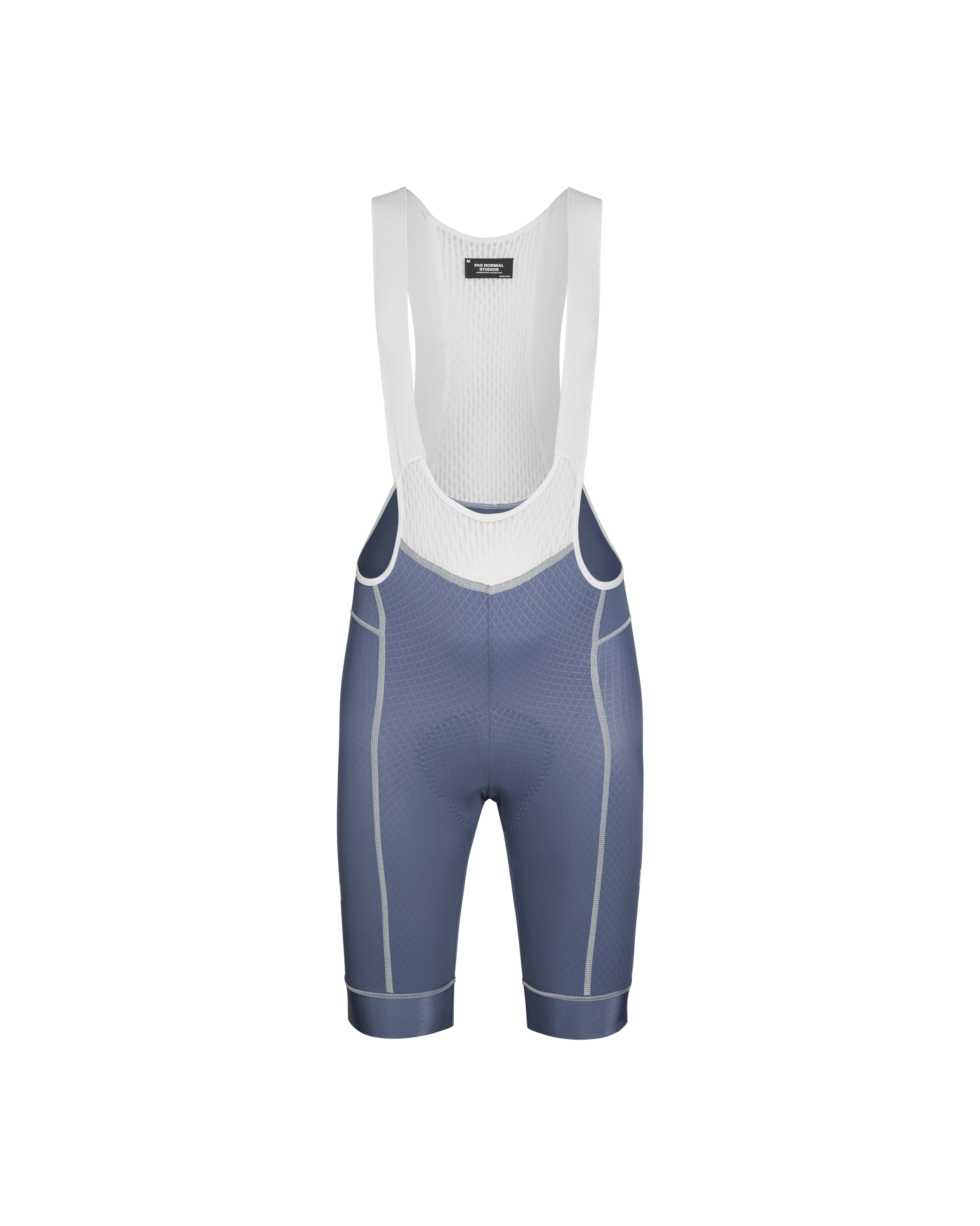 Light Indigo Mechanism cycling bibs, front flat lay with white mesh bib and contrast seam stitching