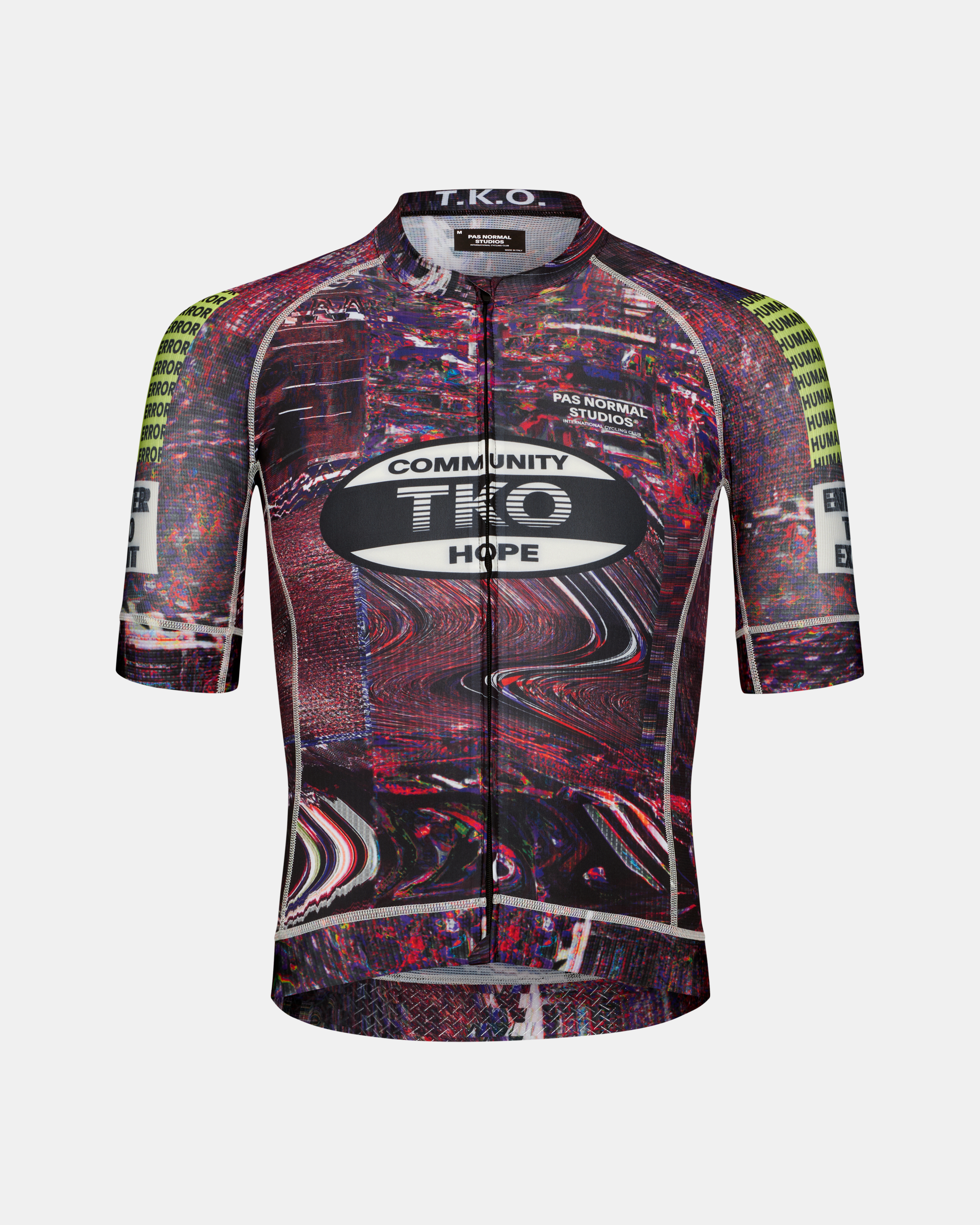 Human Error Pink T.K.O. Mechanism cycling jersey, front flat lay with glitch cityscape AOP and neon sleeve text