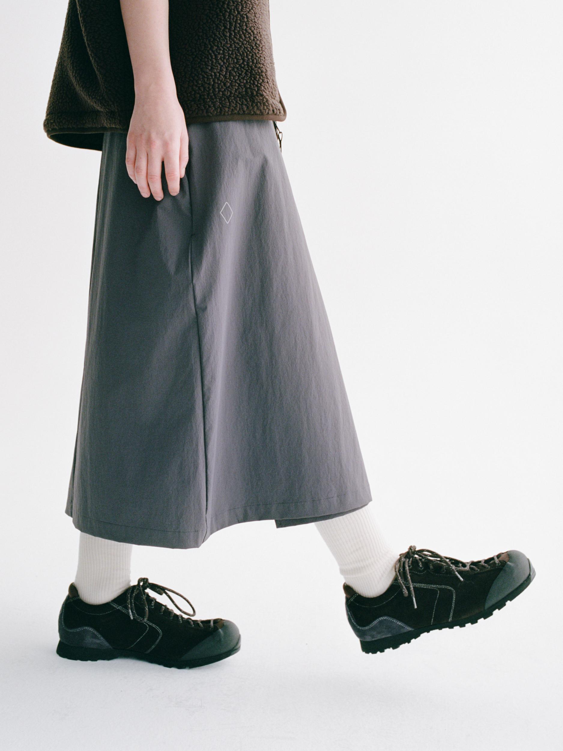 Dark Brown DIEMME MOVIDA'92 shoes on model with green fleece top and grey wide-leg pants