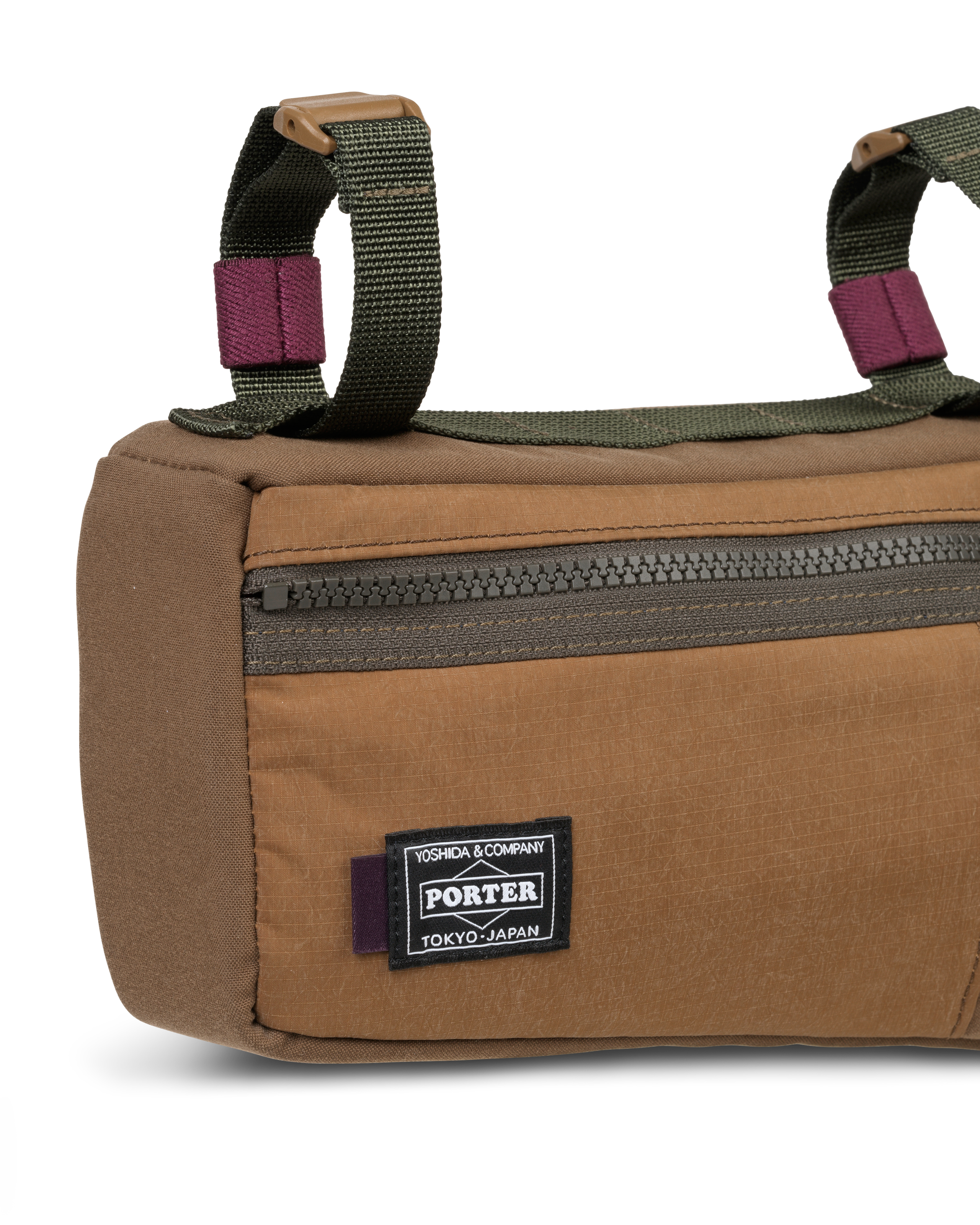 Light Brown Porter-Yoshida cycling frame bag, detail view with front zip pocket and olive green straps
