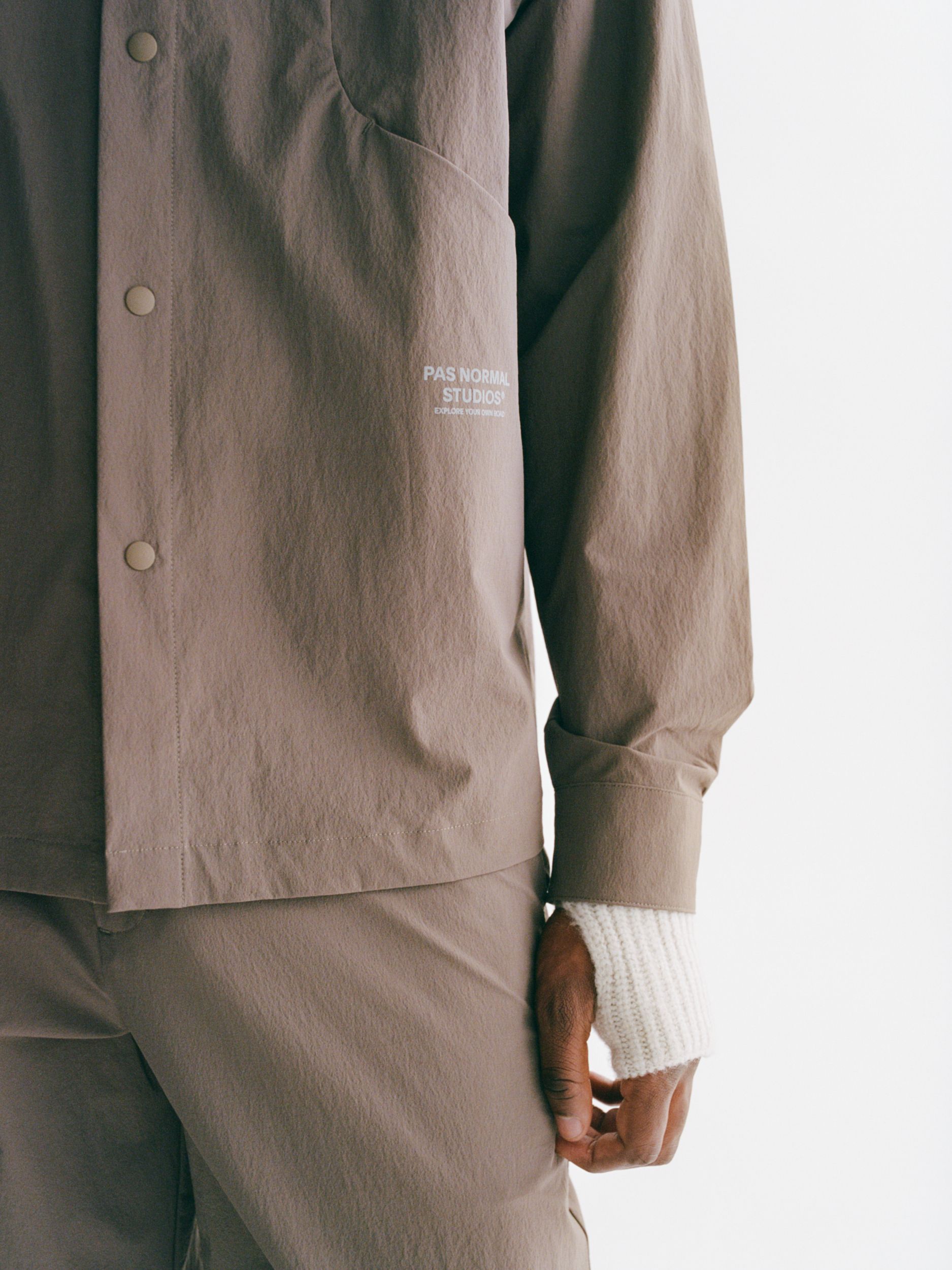 Ash Brown Off-Race Tech Overshirt overshirt on model with snap button closure and white chest logo