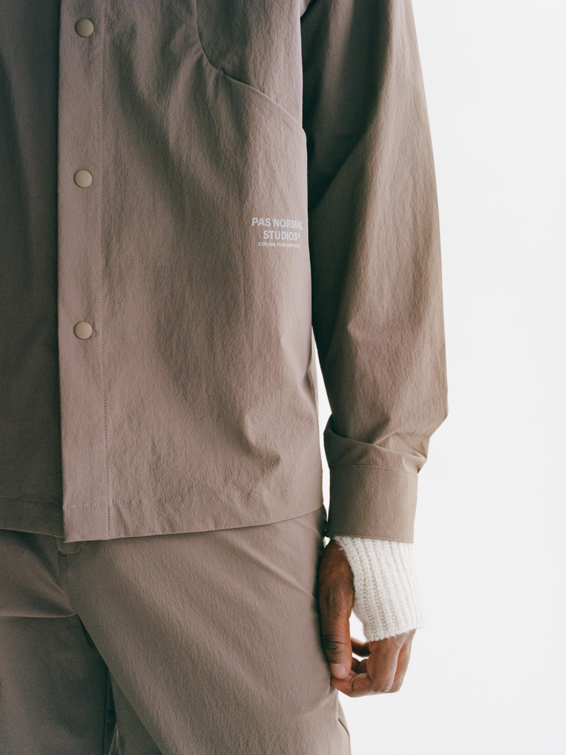 Ash Brown Off-Race Tech Overshirt overshirt on model with snap button closure and white chest logo