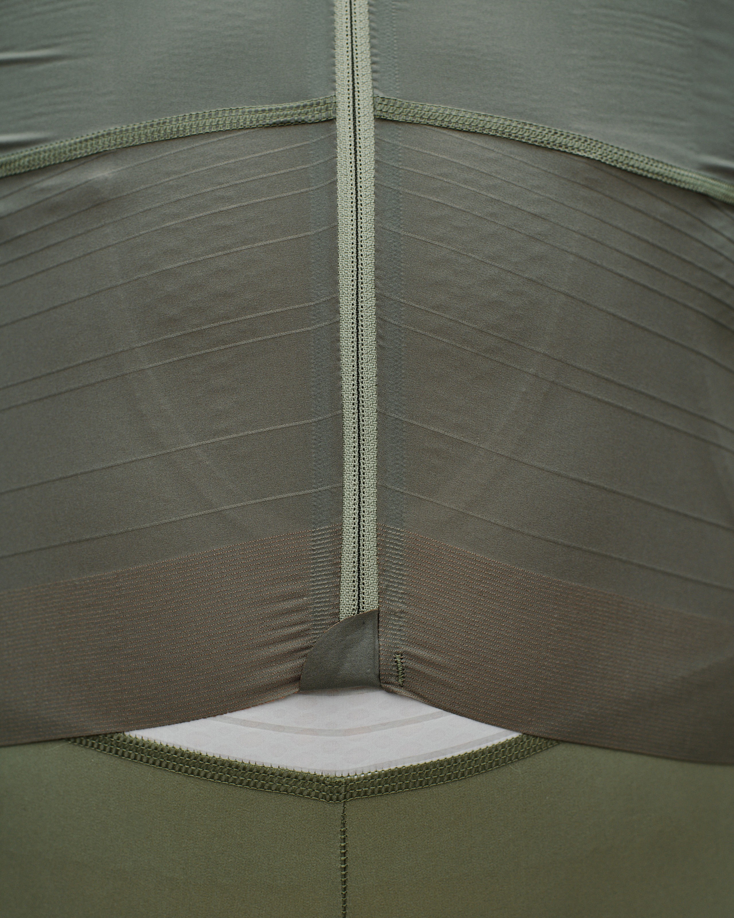 Olive Green PAS Mechanism Pro cycling jersey, detail view with contrast flatlock seaming