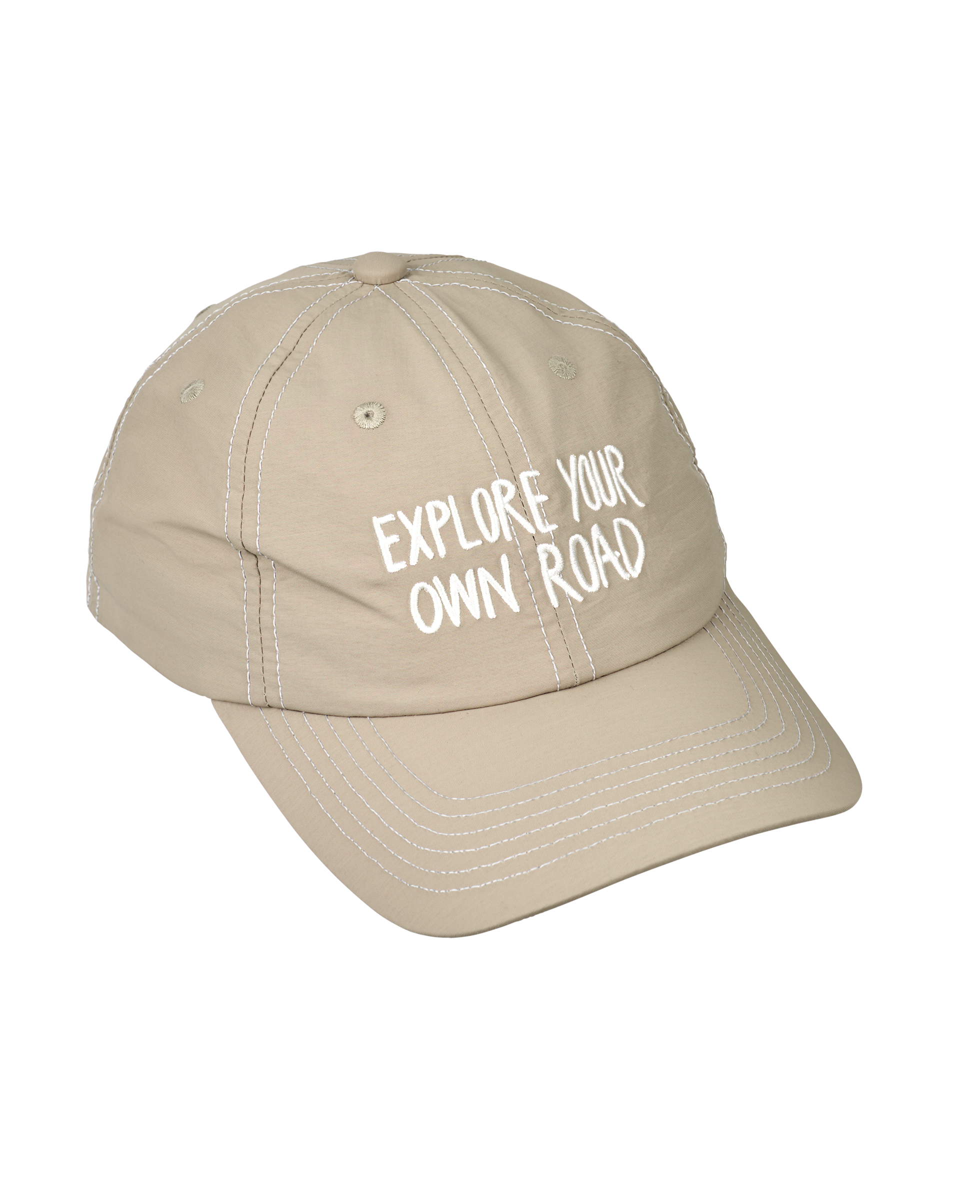 Beige Off-Race cap, angled view with white "Explore Your Own Road" text